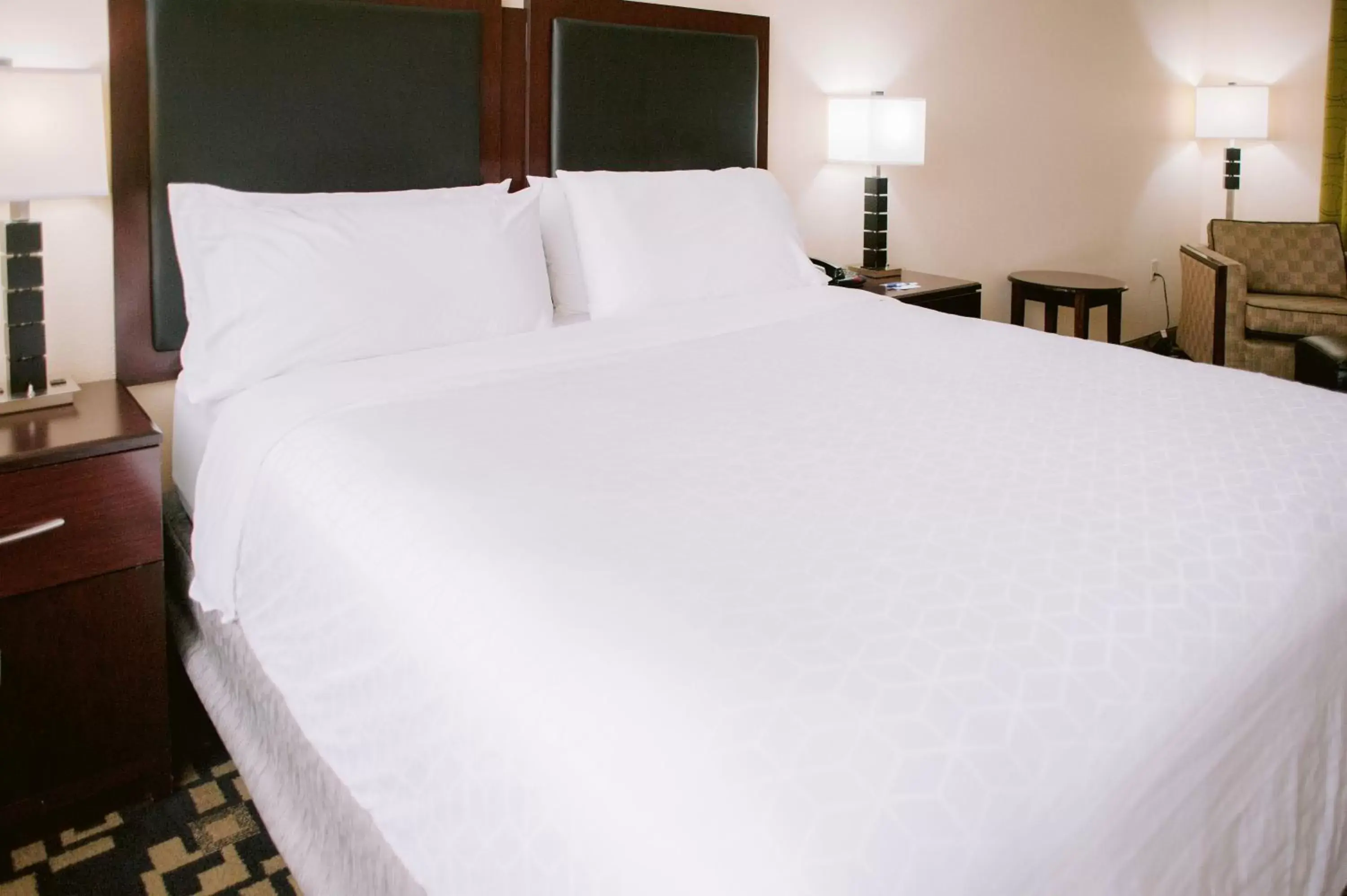 Bed in Holiday Inn Express Hotel Raleigh Southwest, an IHG Hotel