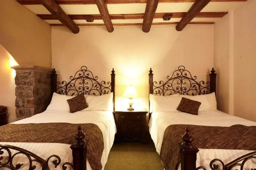 Bed in Hotel Quinta Mision