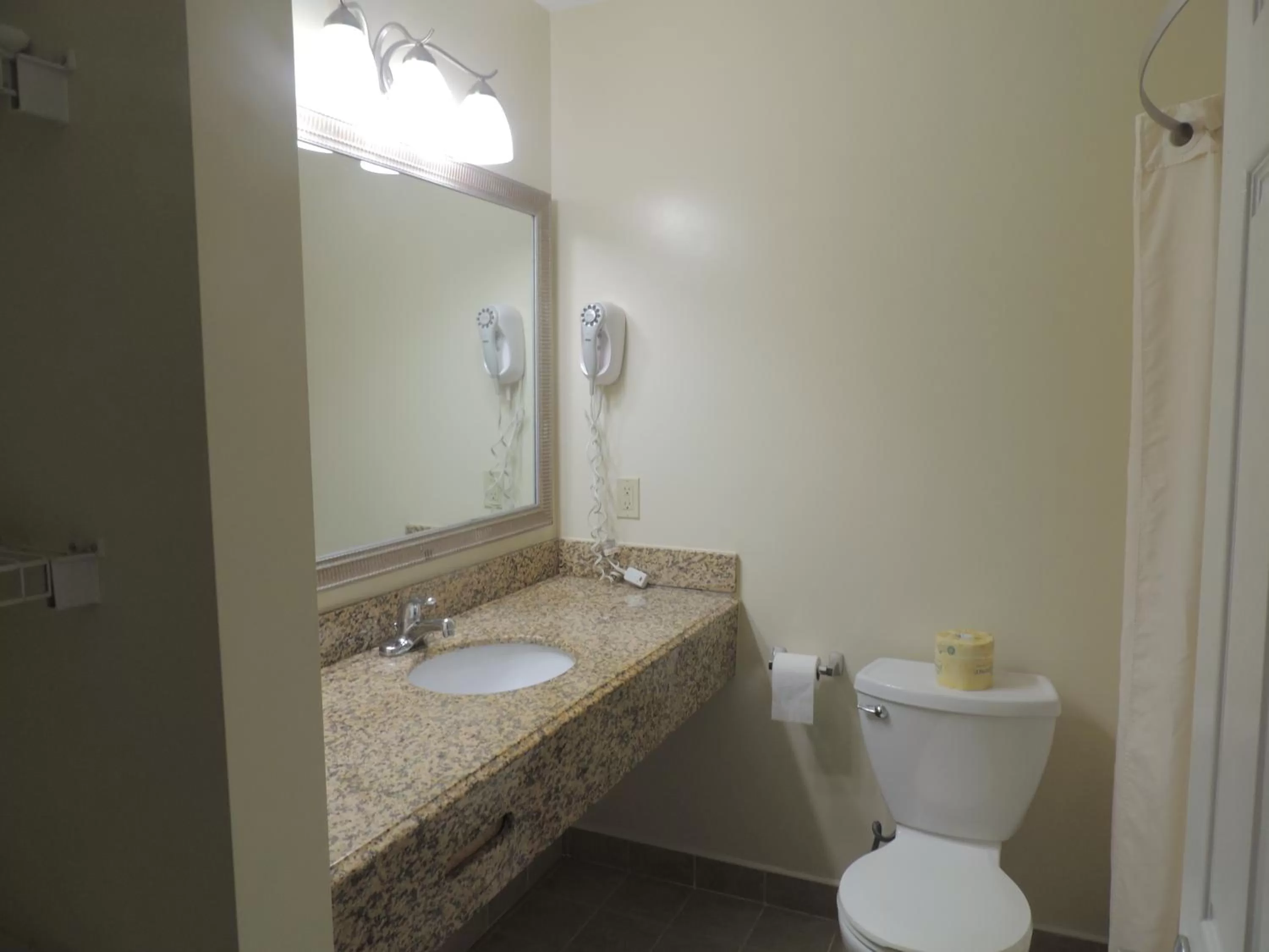 Bathroom in Super 8 by Wyndham Mifflinville Near Bloomsburg
