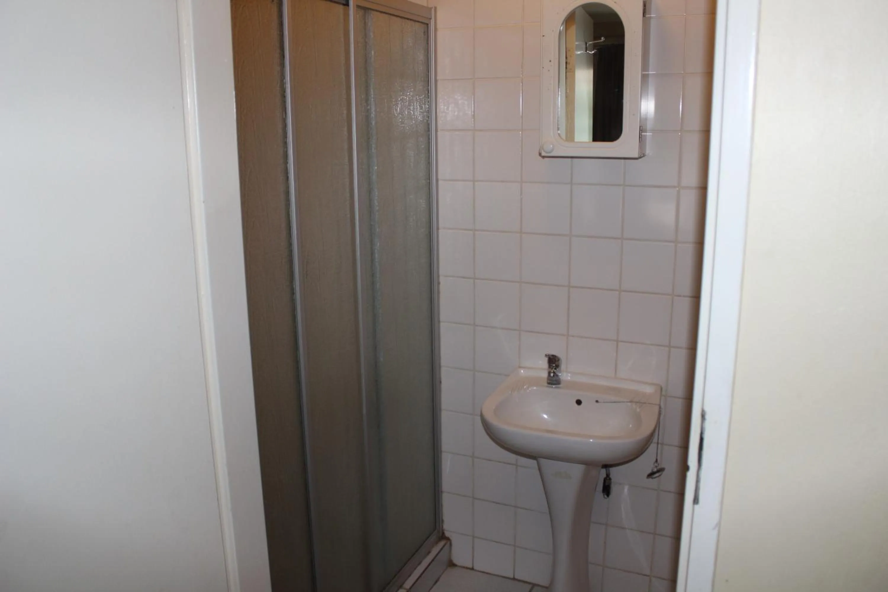 Toilet in Purple Olive Guest House