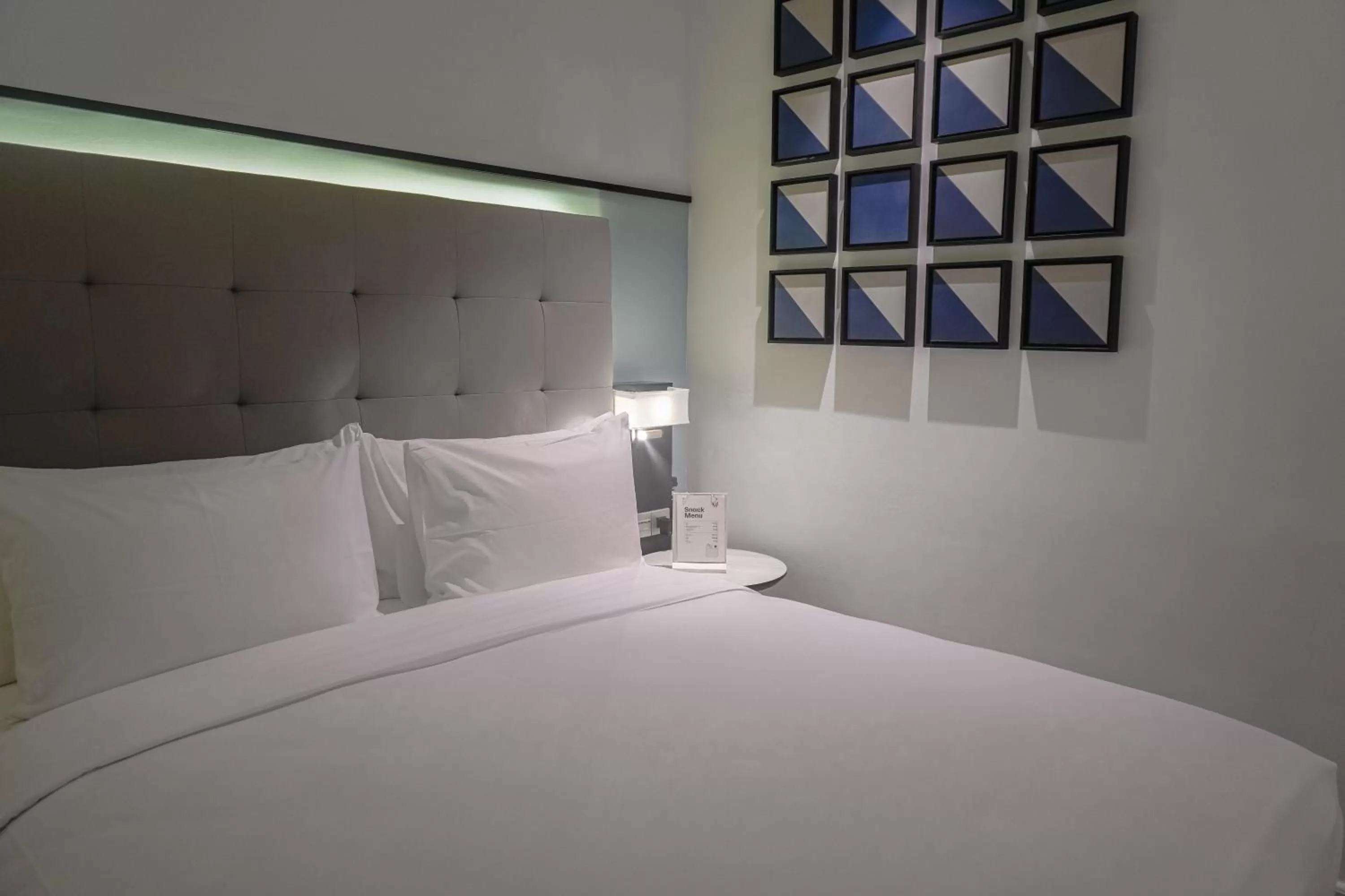 Bed in M Village Hotel Tôn Thất Đạm