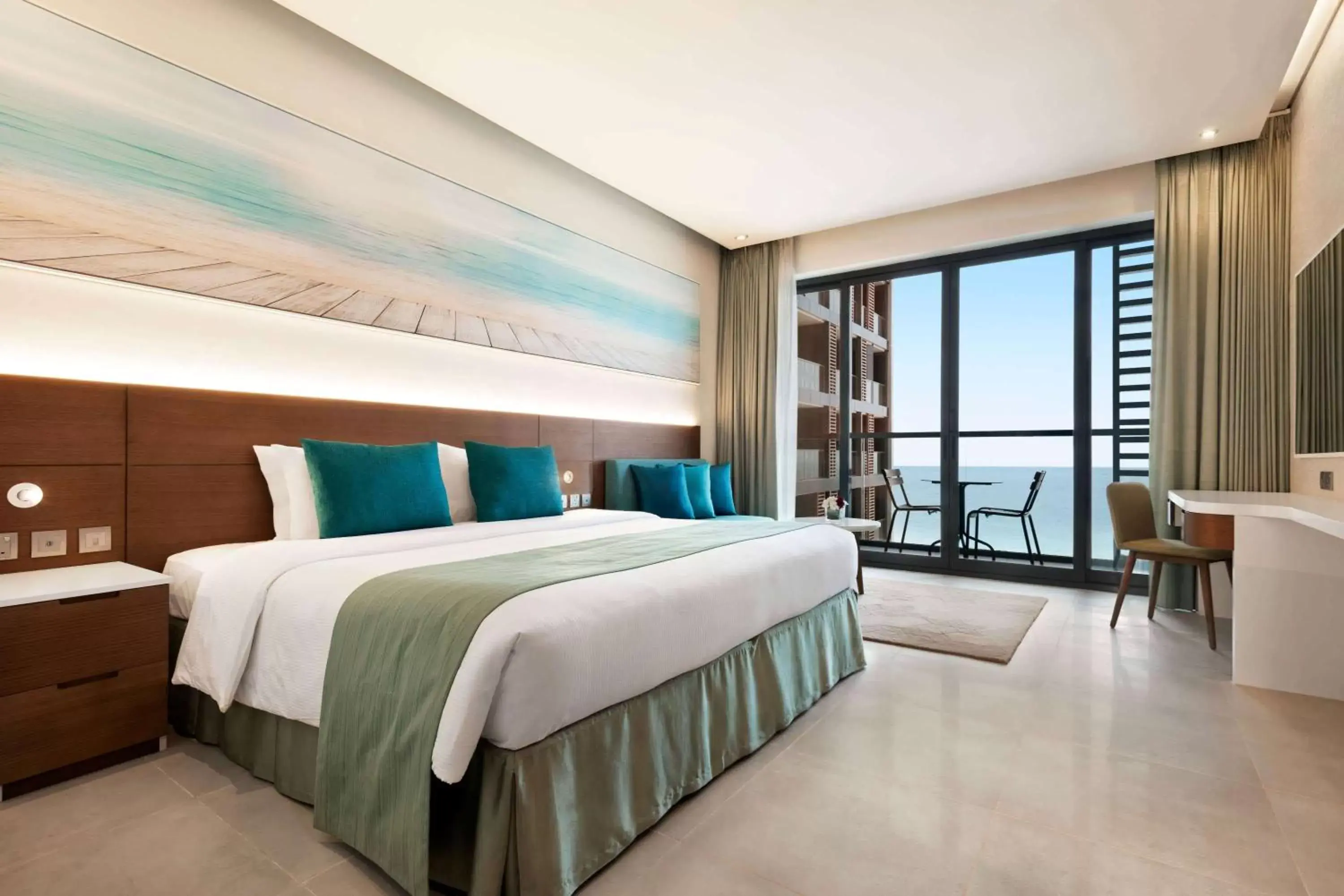 Photo of the whole room, Bed in Wyndham Garden Ajman Corniche