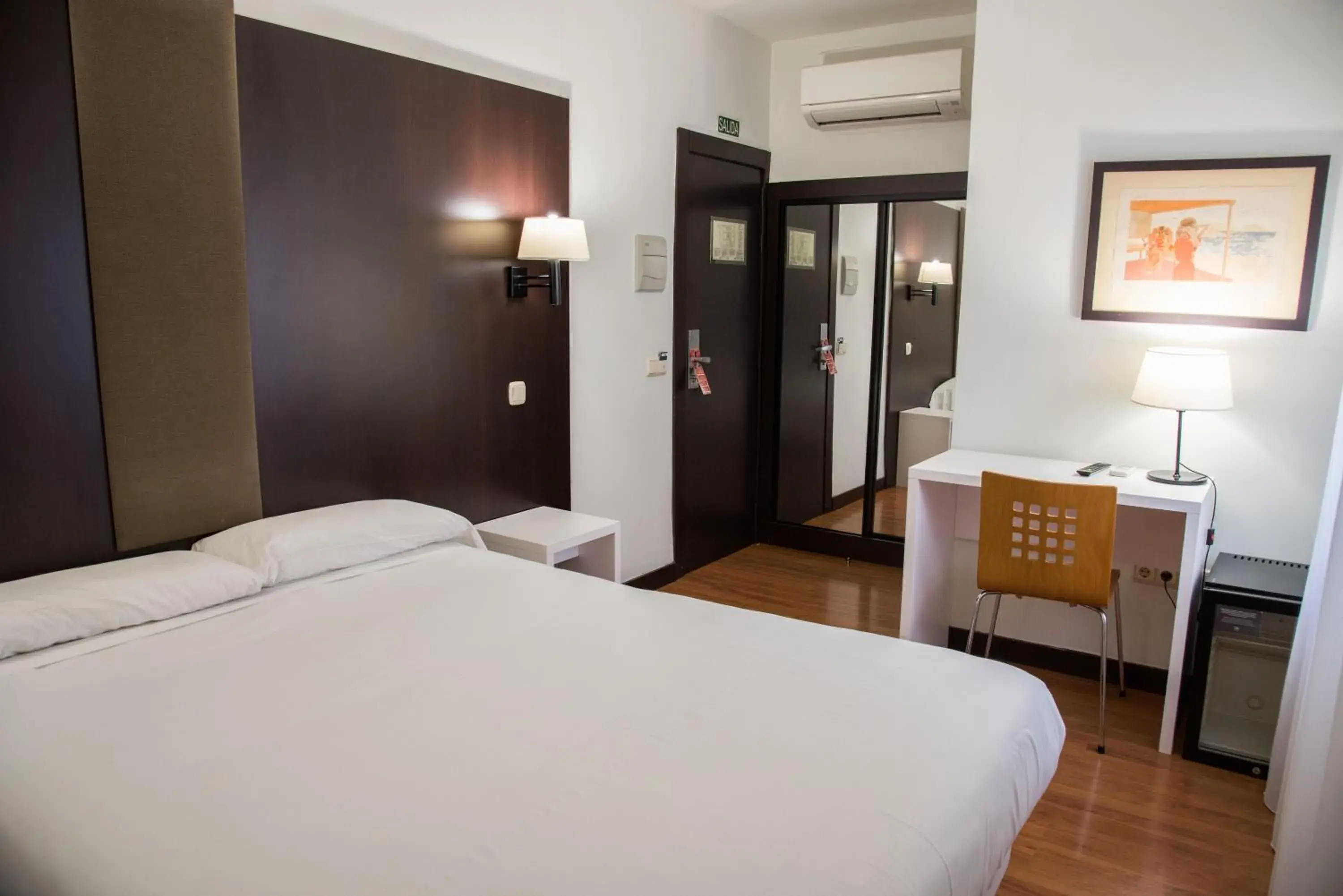 Bed in Hotel Delta