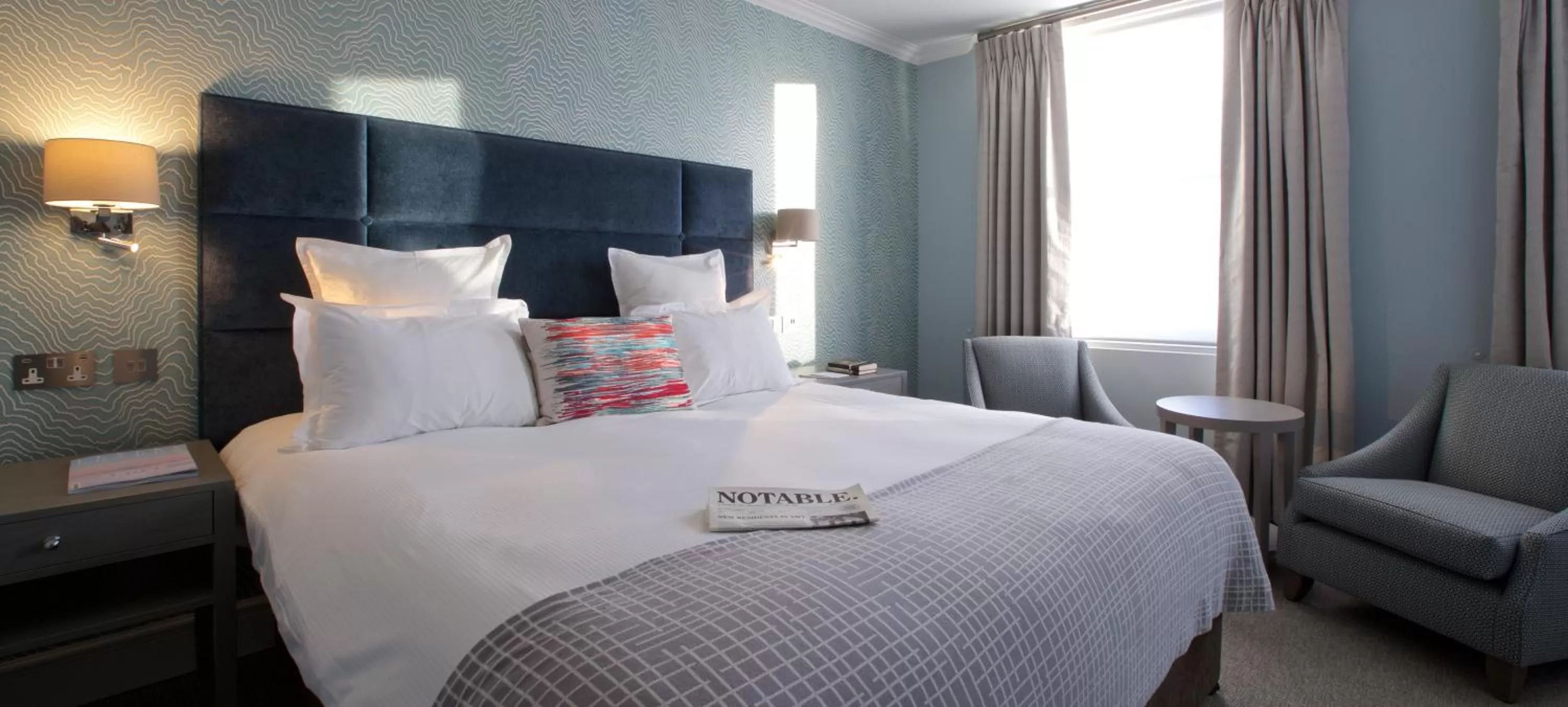 Bed in 54 Queen's Gate Hotel