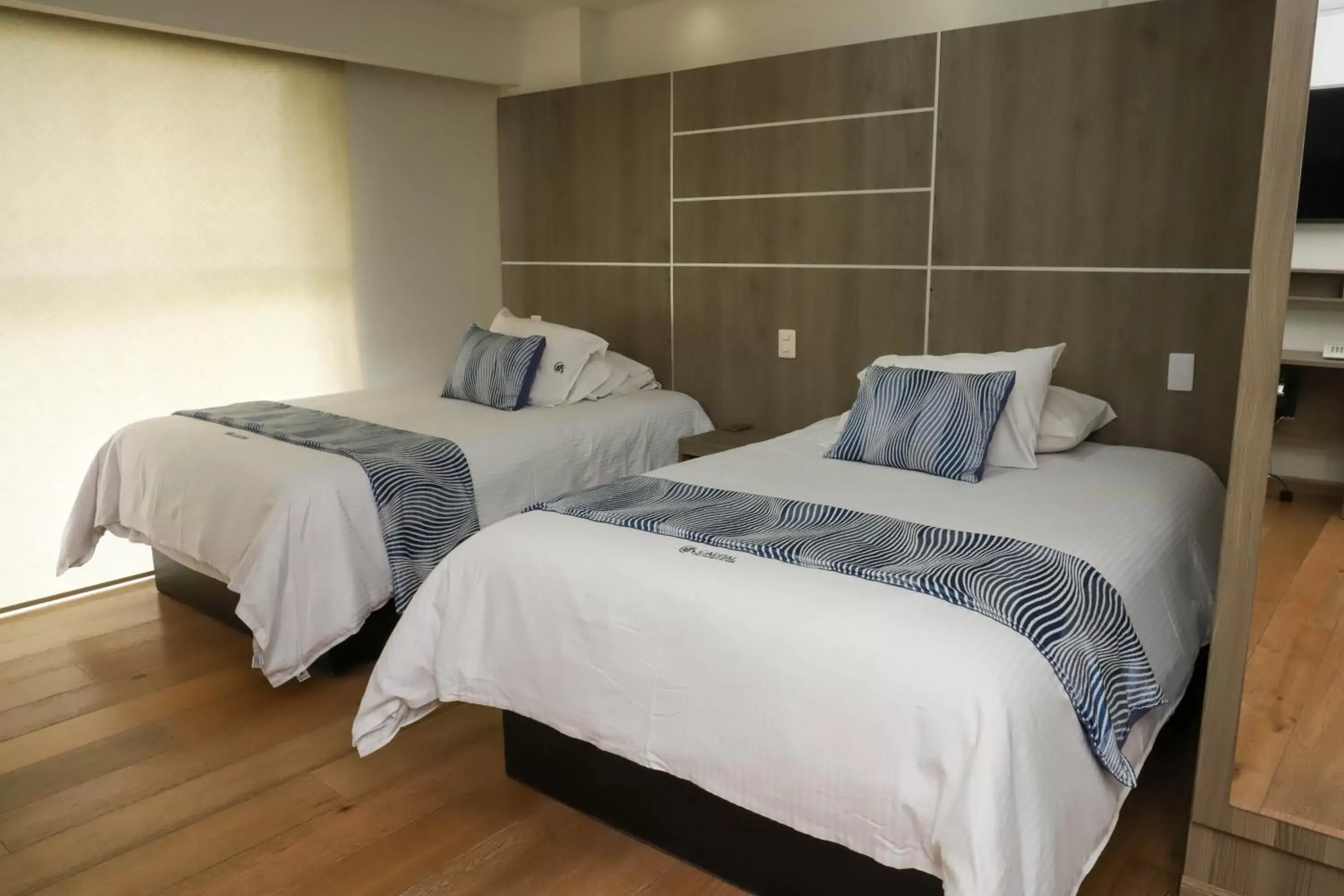 Bed in Capital Luxury Apartments & Offices