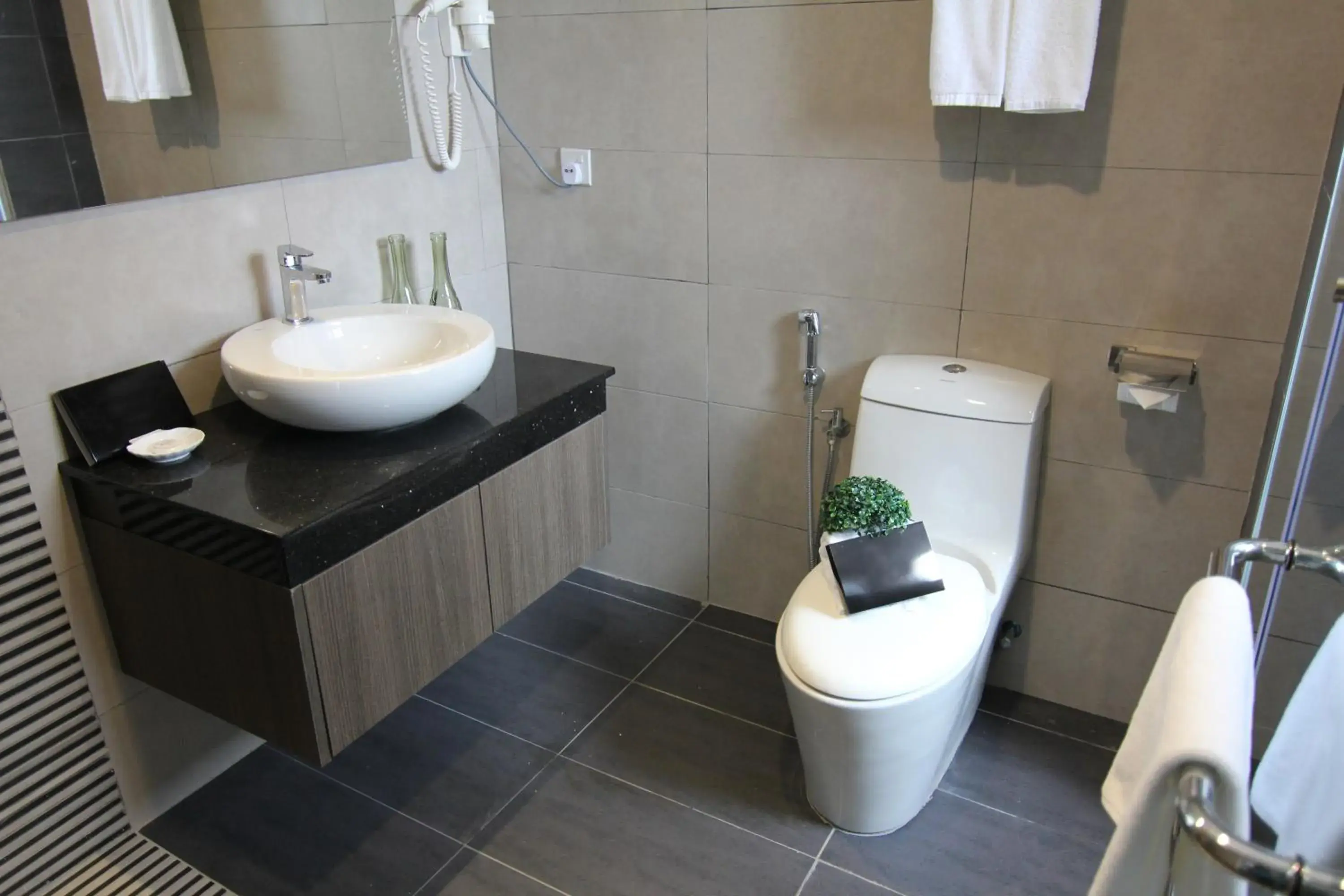 Bathroom in Nexus Business Suite Hotel