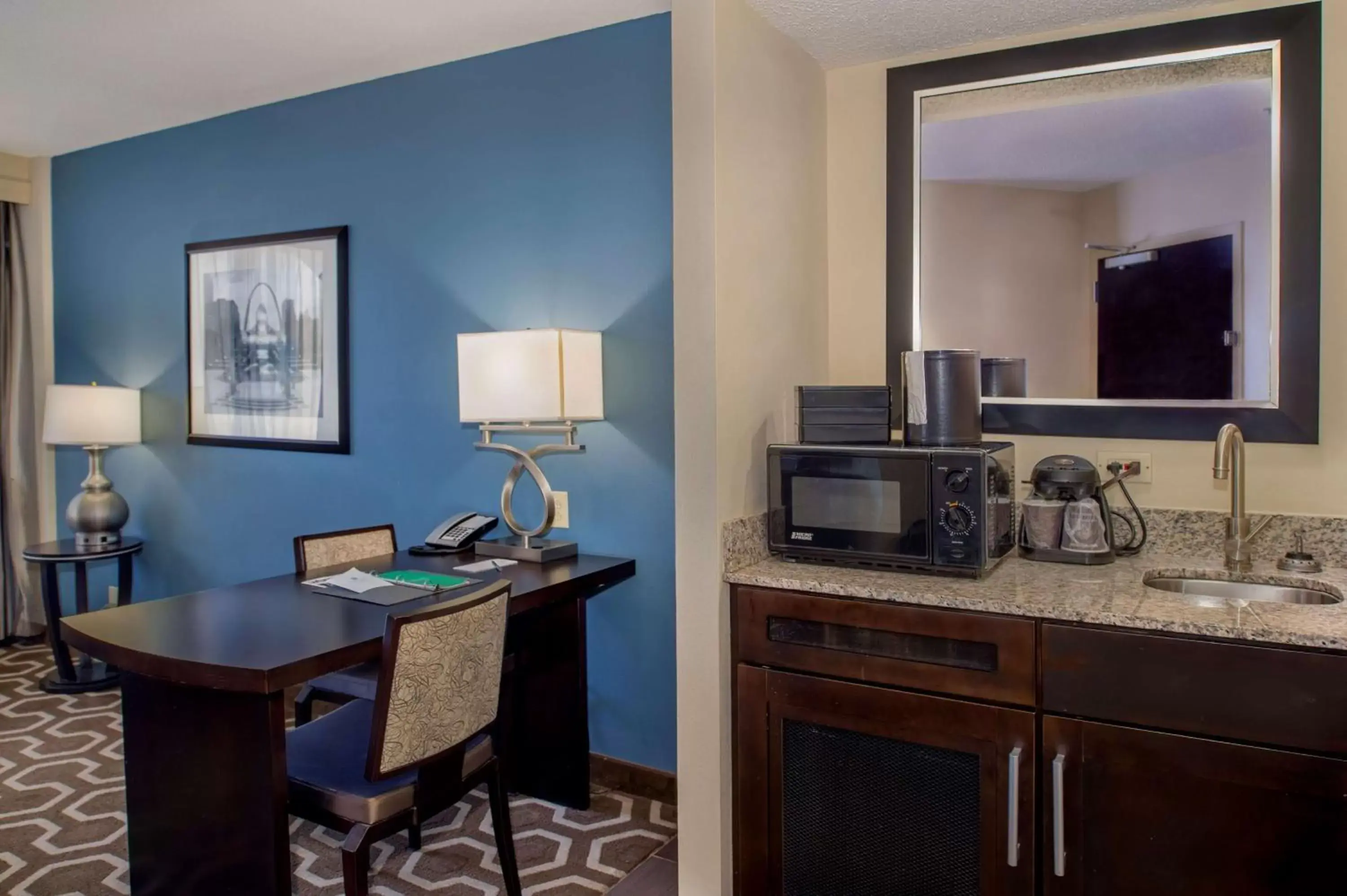 Bedroom, Kitchen/Kitchenette in Embassy Suites by Hilton St Louis Airport