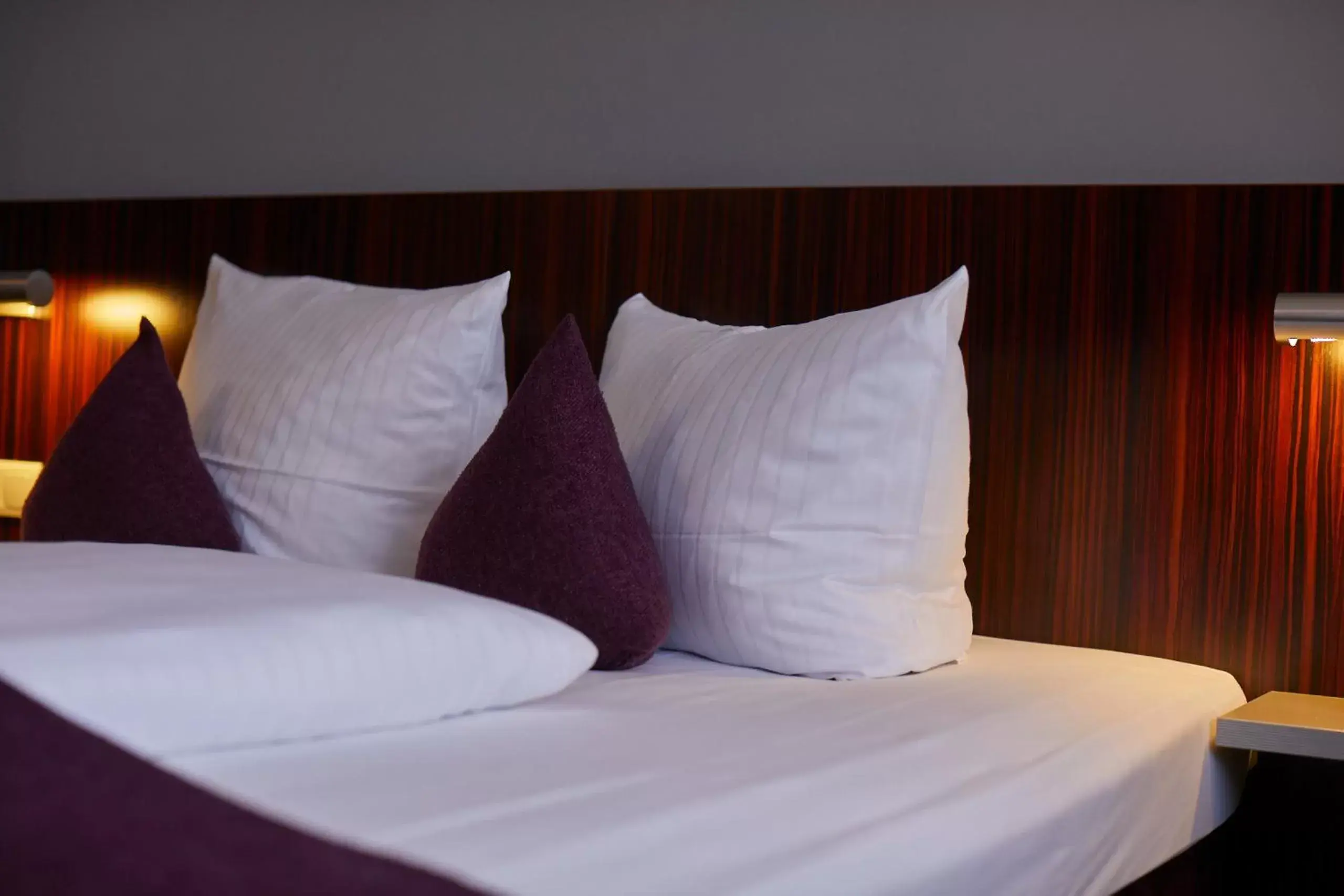 Bed in Hotel Metropol by Maier Privathotels