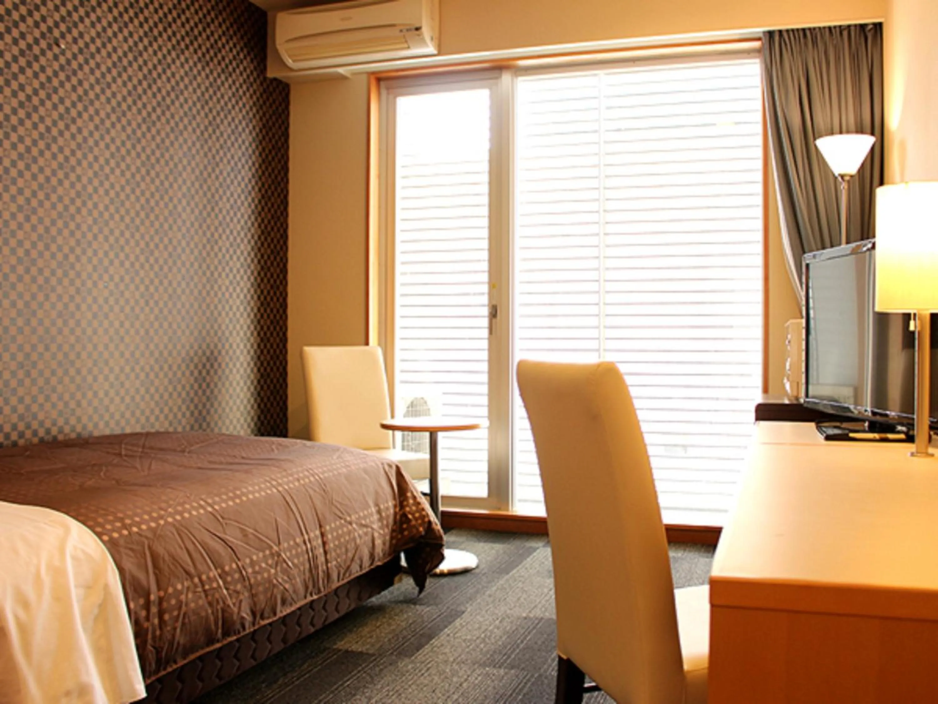 Bed in HOTEL LiVEMAX BUDGET Chiba Mihama