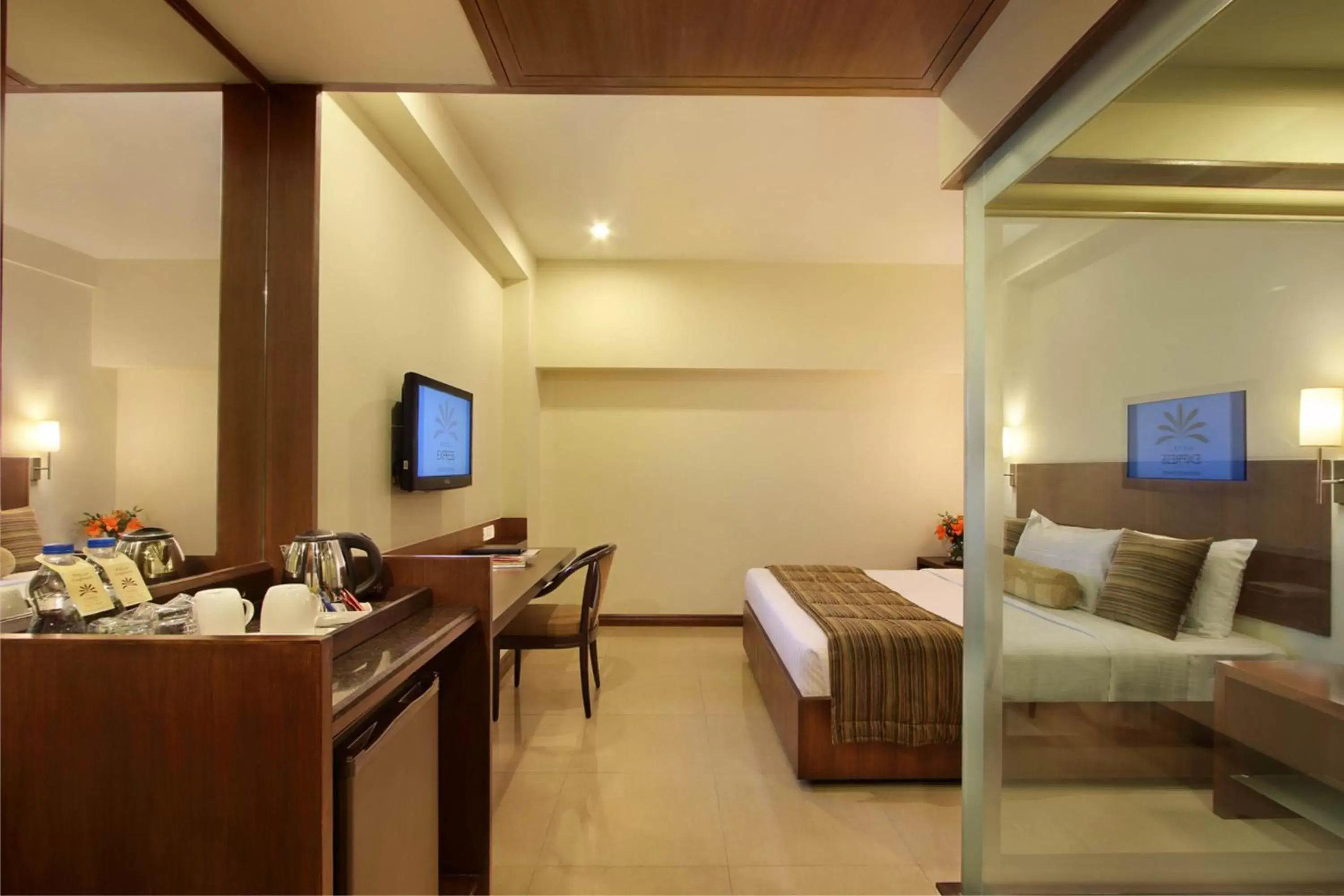 Photo of the whole room, TV/Entertainment Center in Hotel Express Residency Vadodara