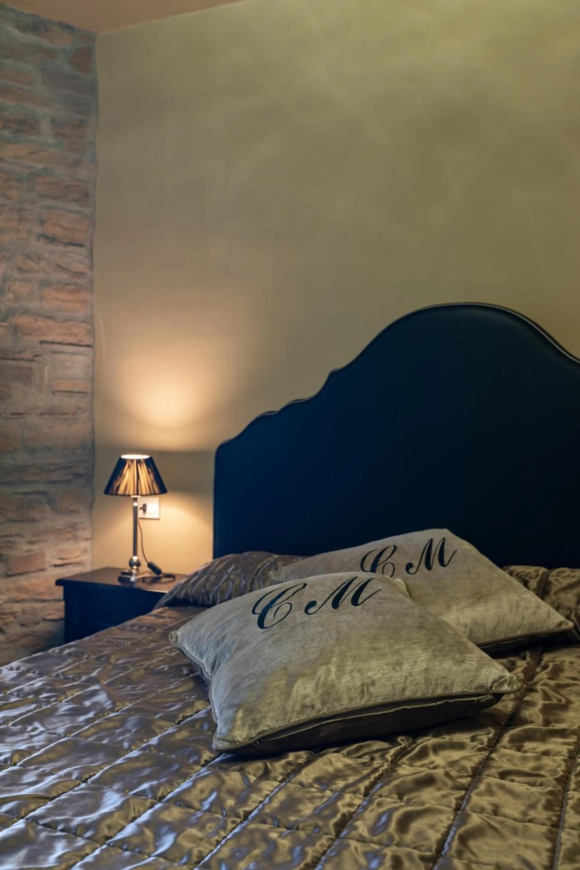 Bed in La Locanda Del Conte Mameli