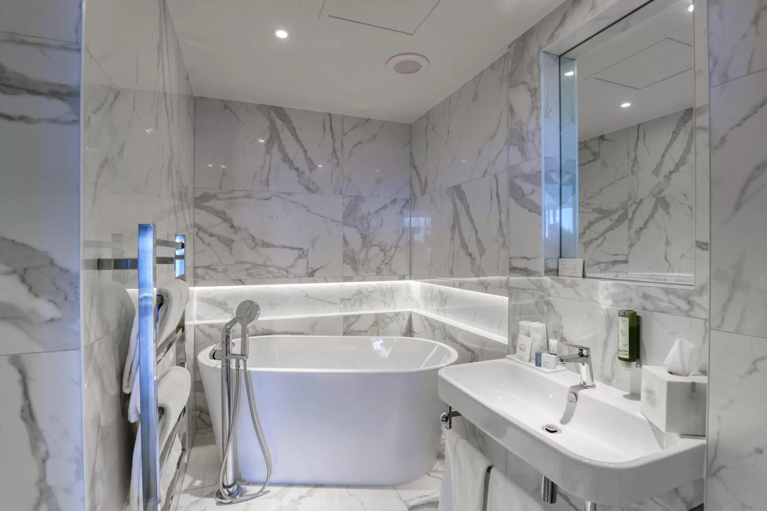 Bathroom in Ramada Suites by Wyndham Nautilus Orewa