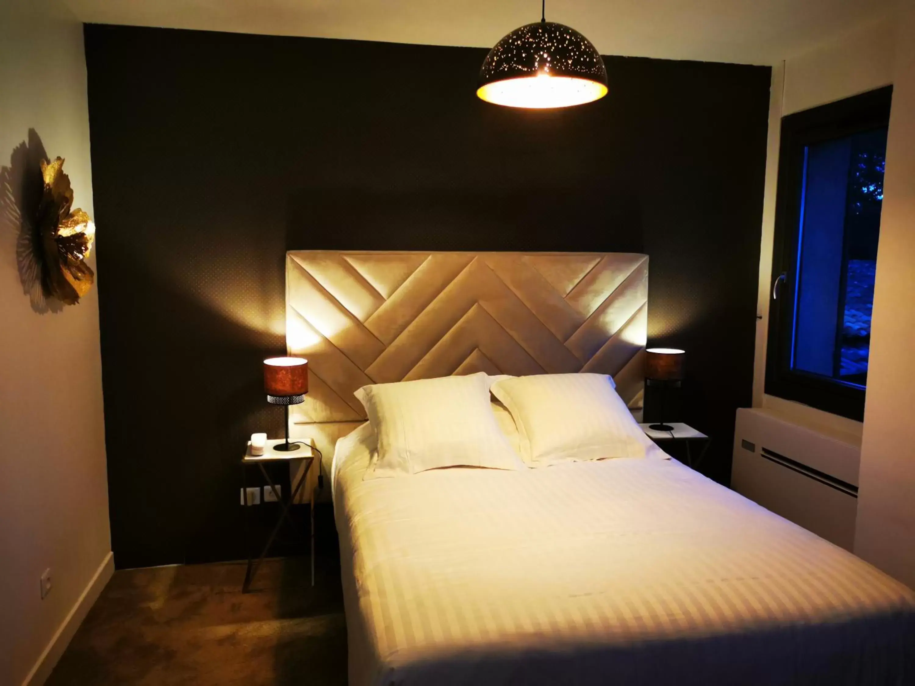 Bed in La Villa Dune, Hôtel & Spa Nuxe