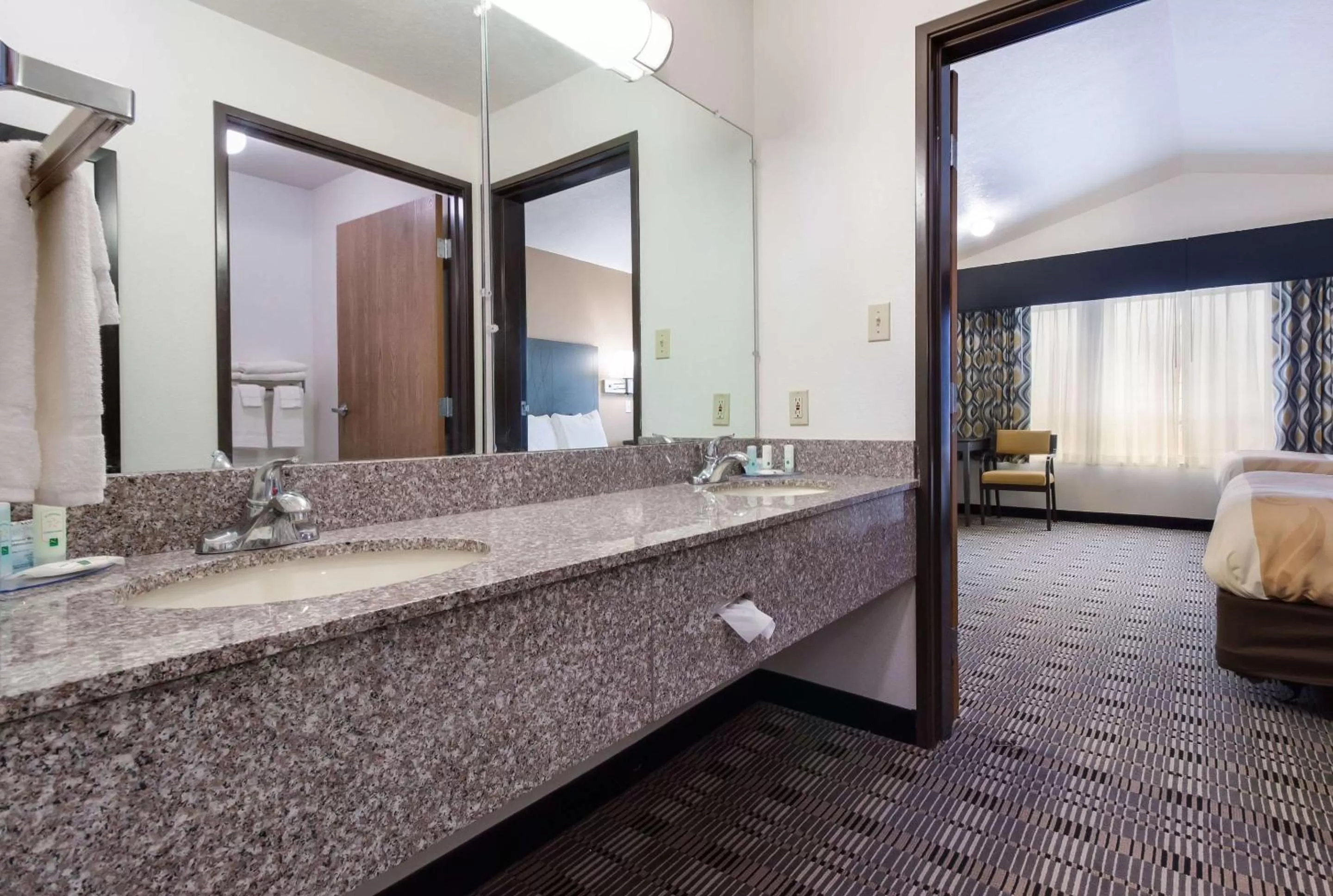 Bathroom, Bed in Quality Inn & Suites McCook