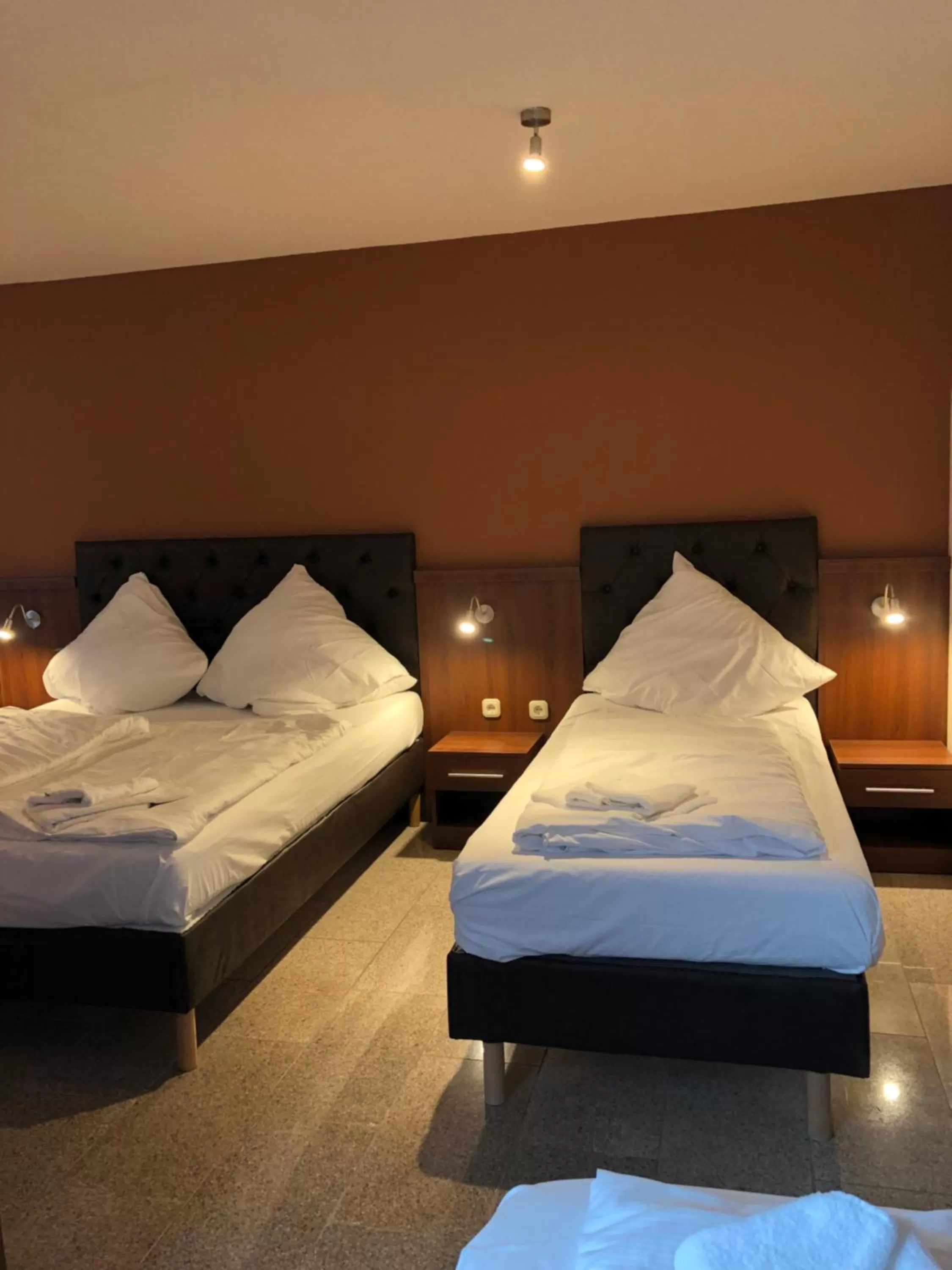 Bed in Hotel Poseidon