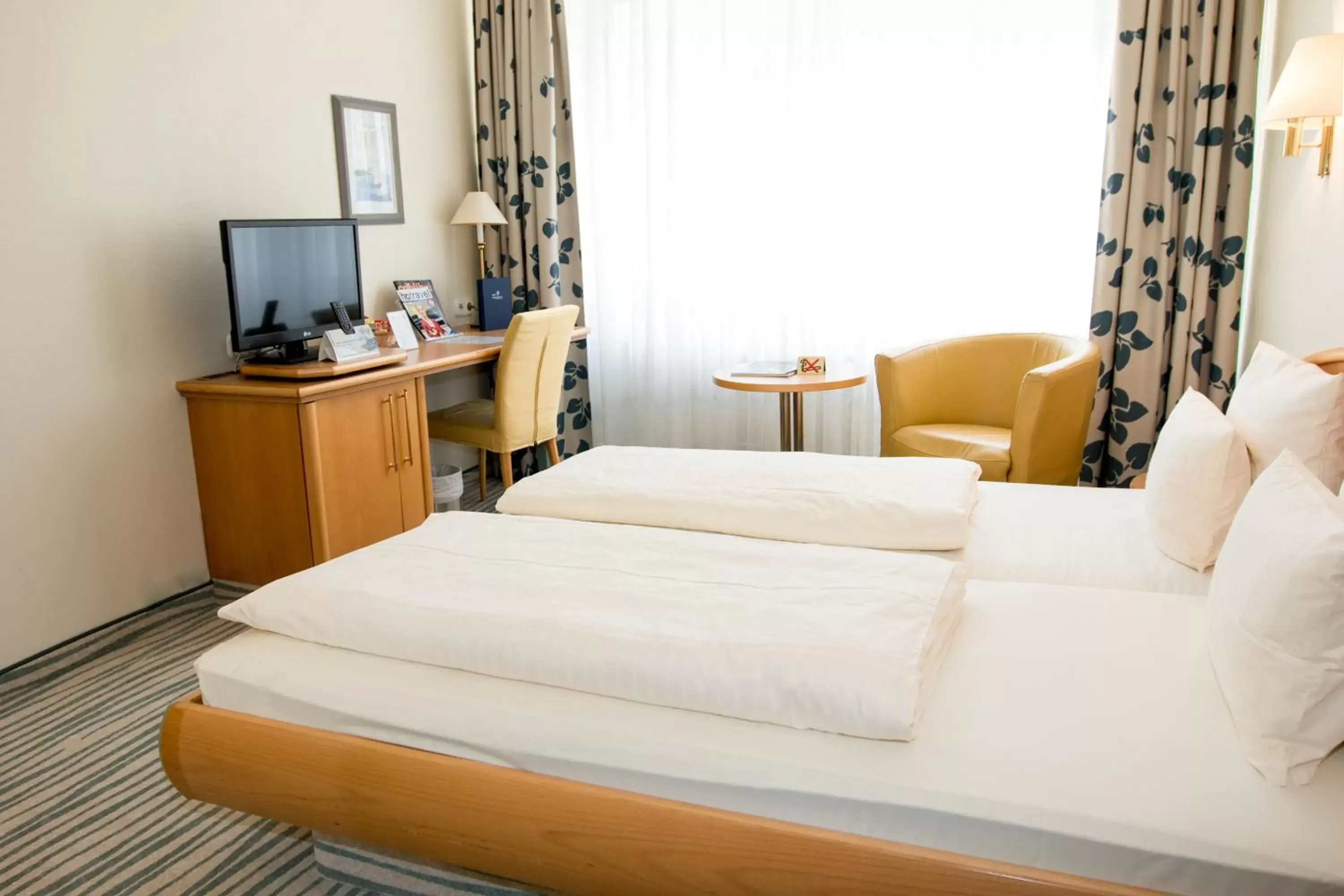 Photo of the whole room, Bed in Hotel Stadt München