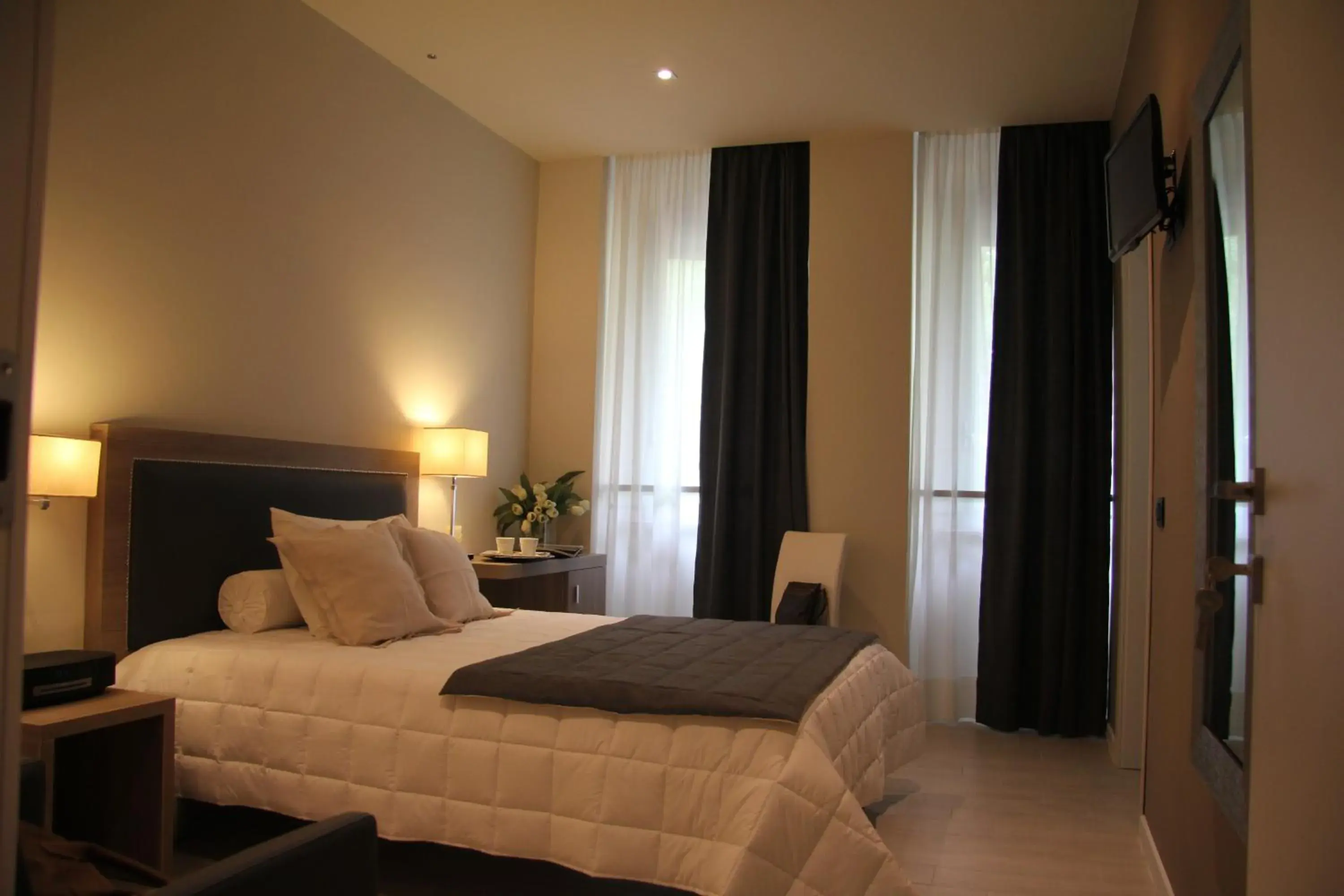 Photo of the whole room, Bed in Hotel Zara Milano