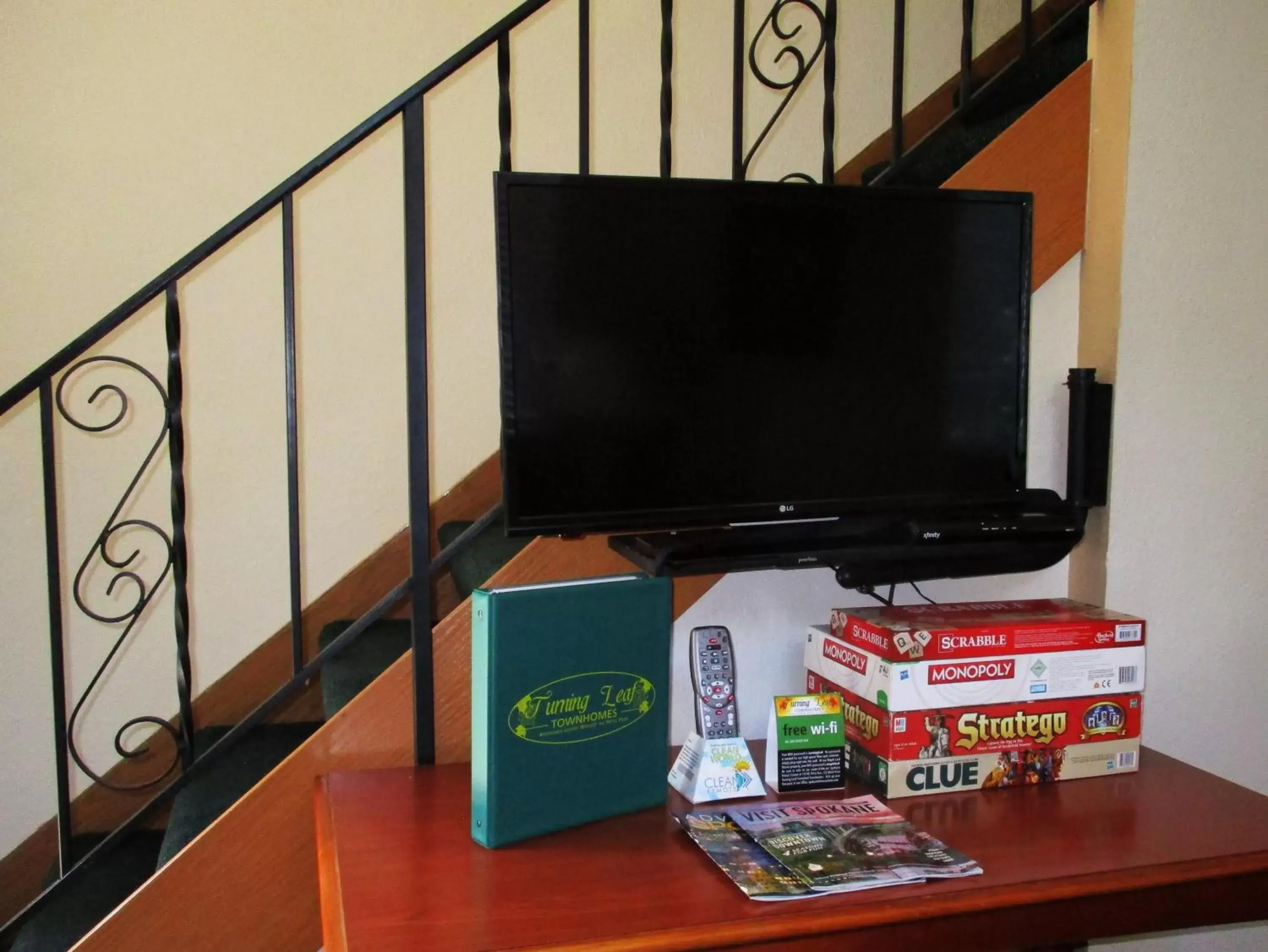 Living room, TV/Entertainment Center in Turning Leaf Townhome Suites