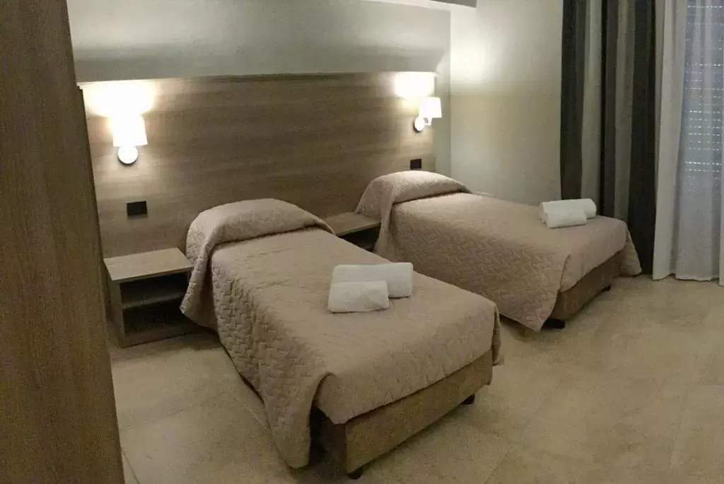 Bed in La Giummara Rooms