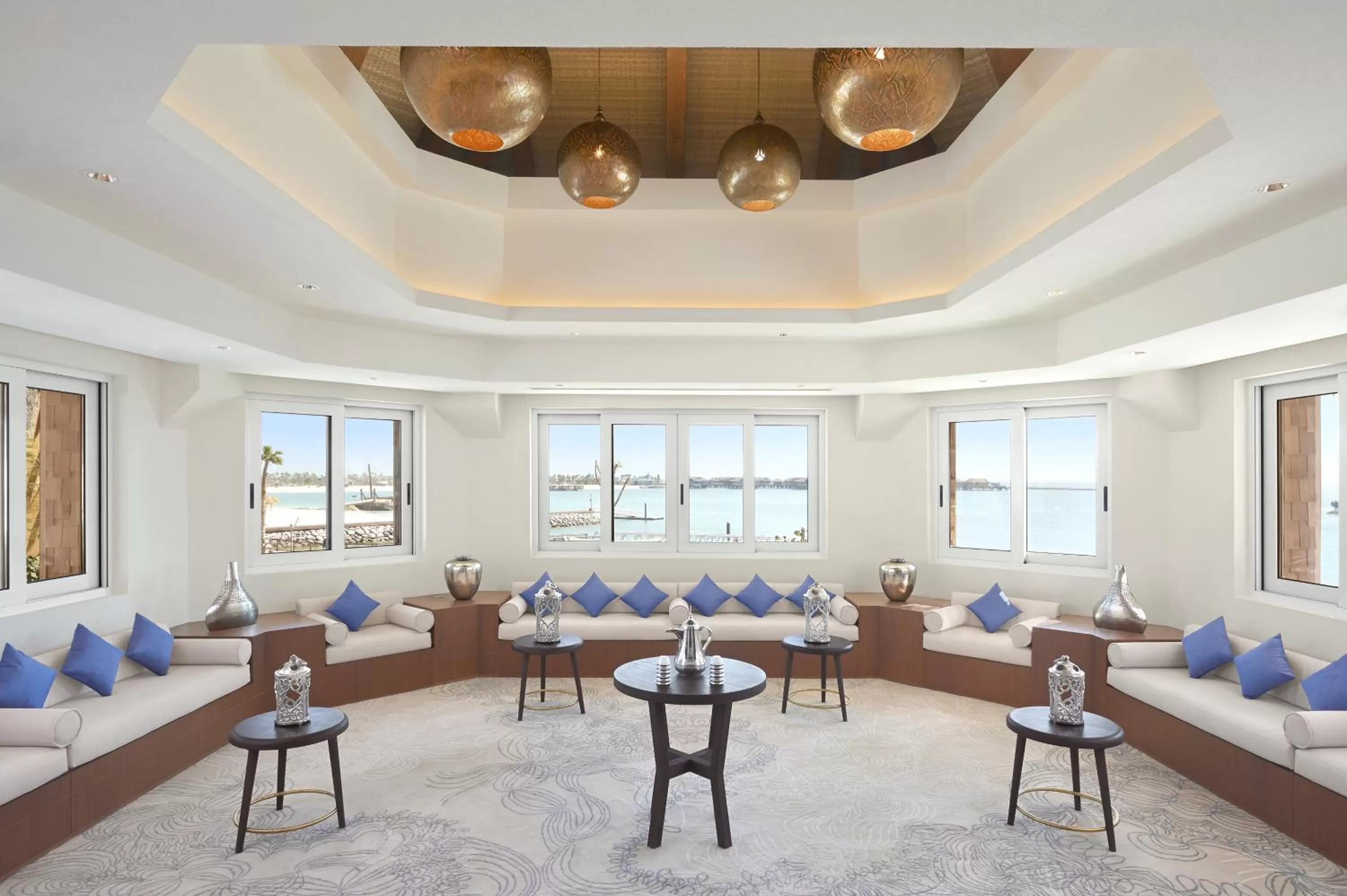 Communal lounge/ TV room in Banana Island Resort Doha by Anantara