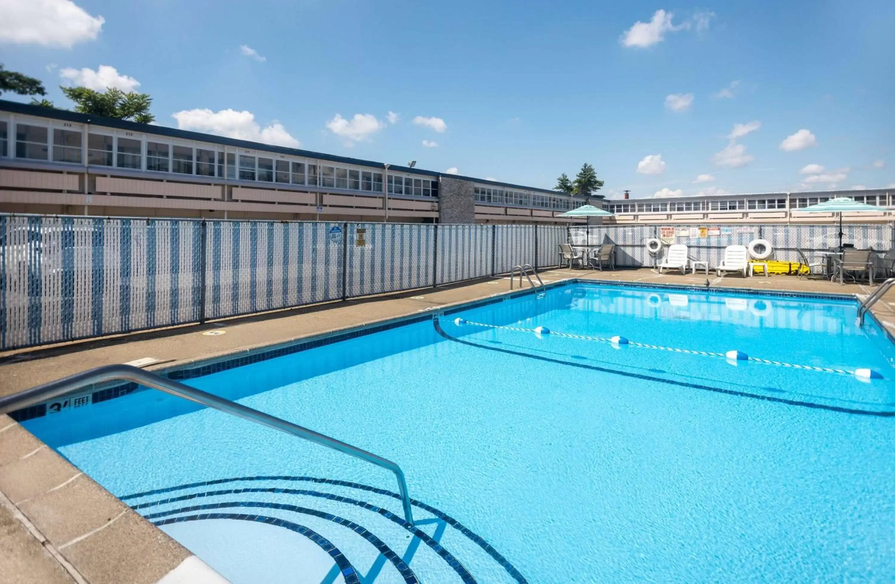 Pool view, Swimming Pool in Days Inn by Wyndham Hicksville Long Island