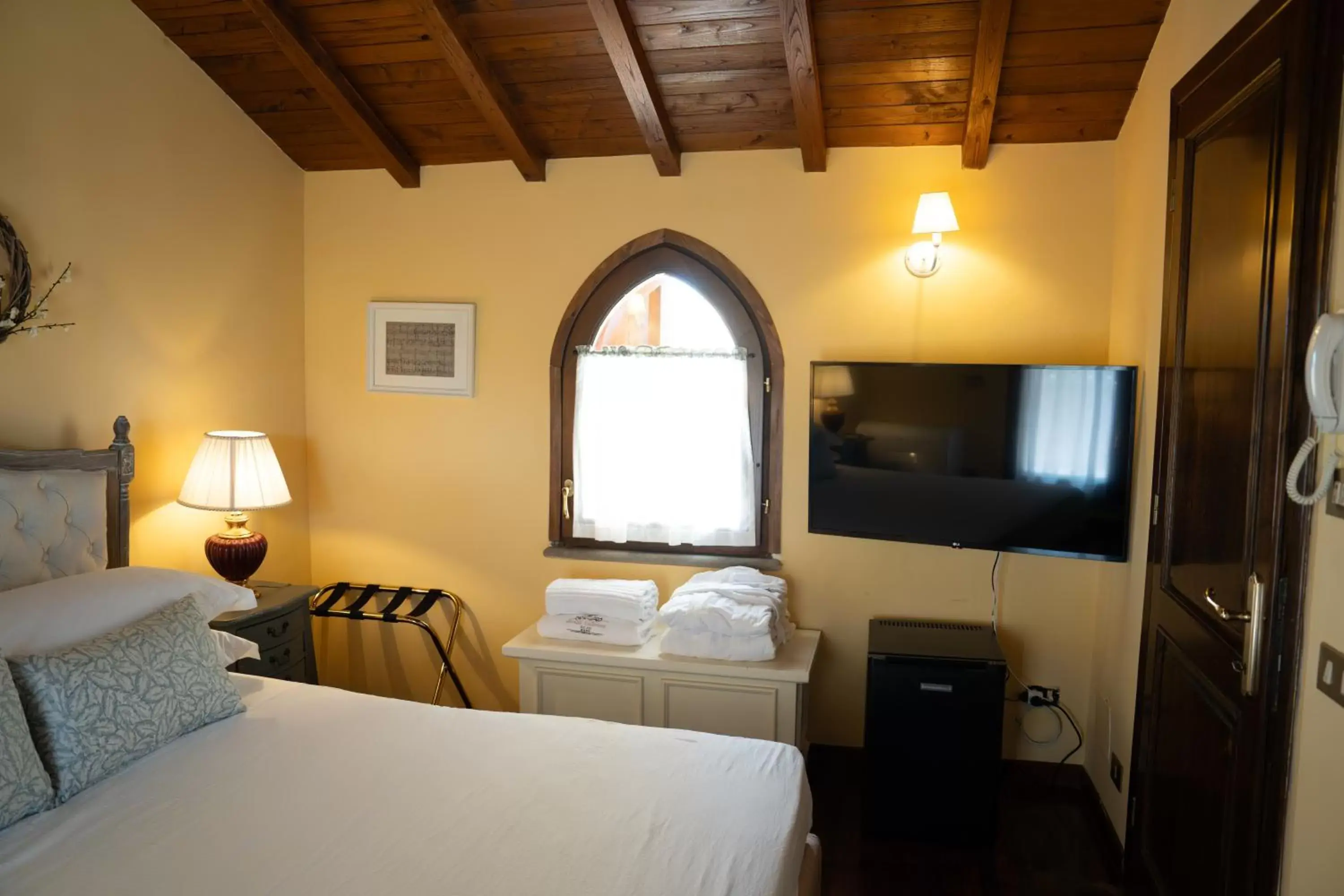 Bed in Relais Santa Caterina Hotel