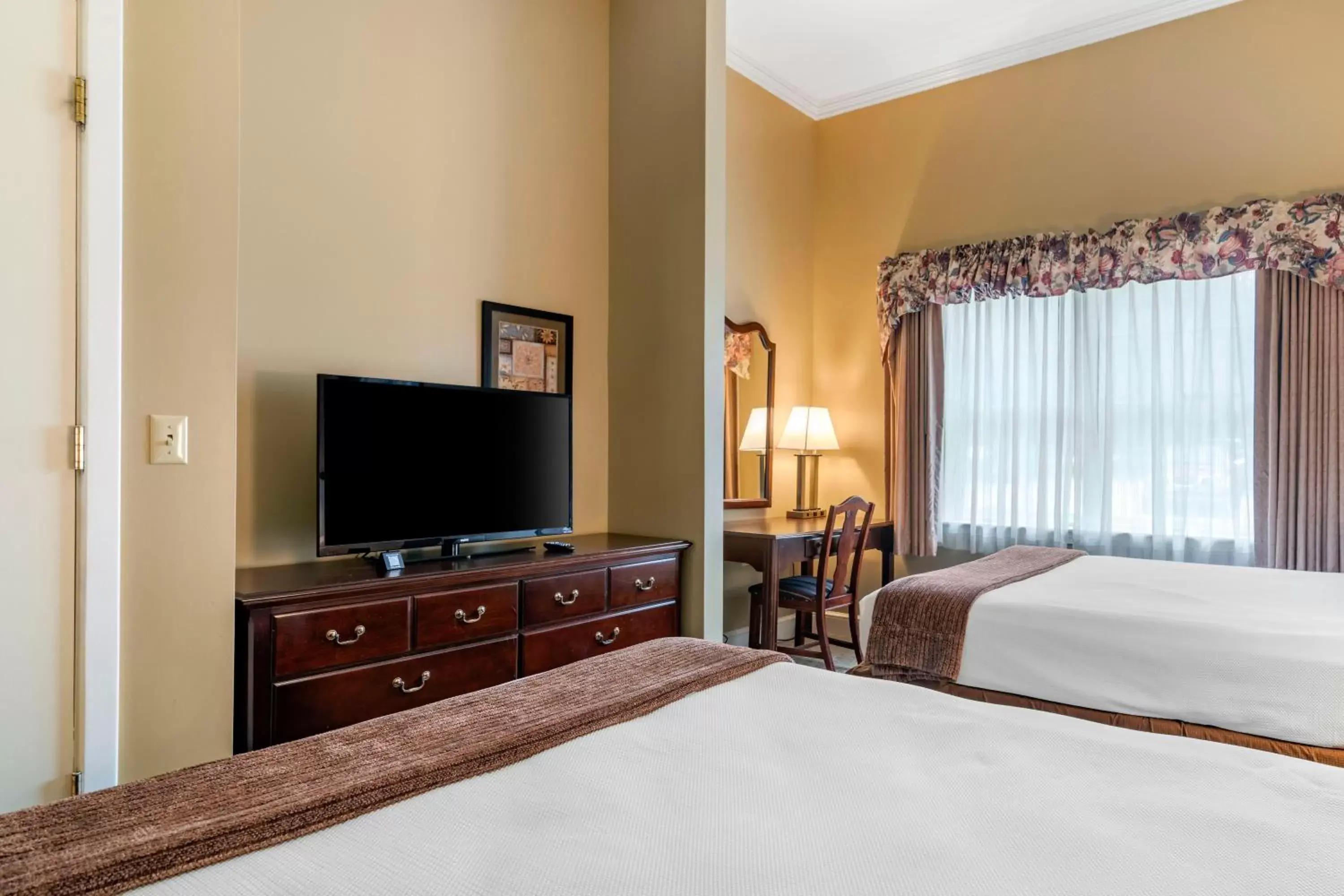 Bed in The Bethel Resort & Suites