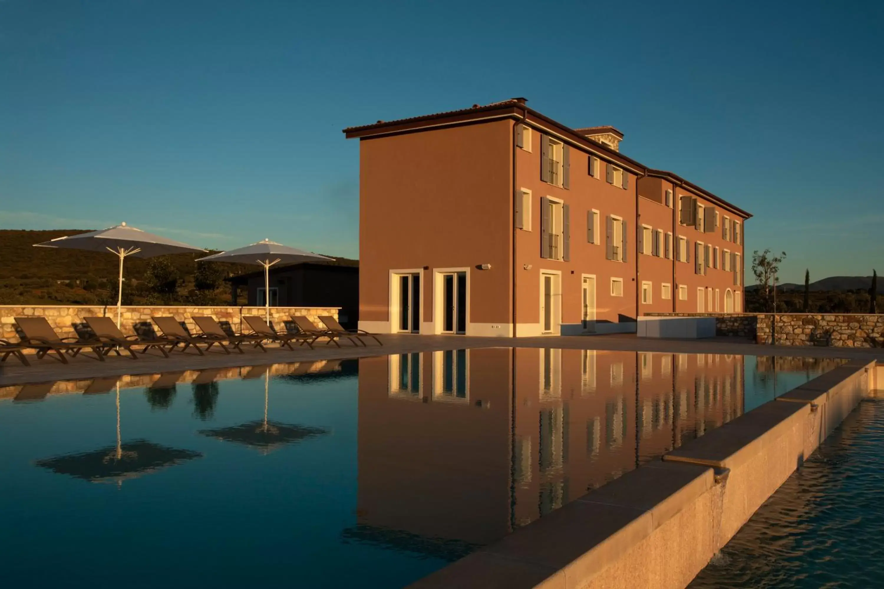 Swimming pool, Property Building in Riva Toscana Golf Resort & SPA