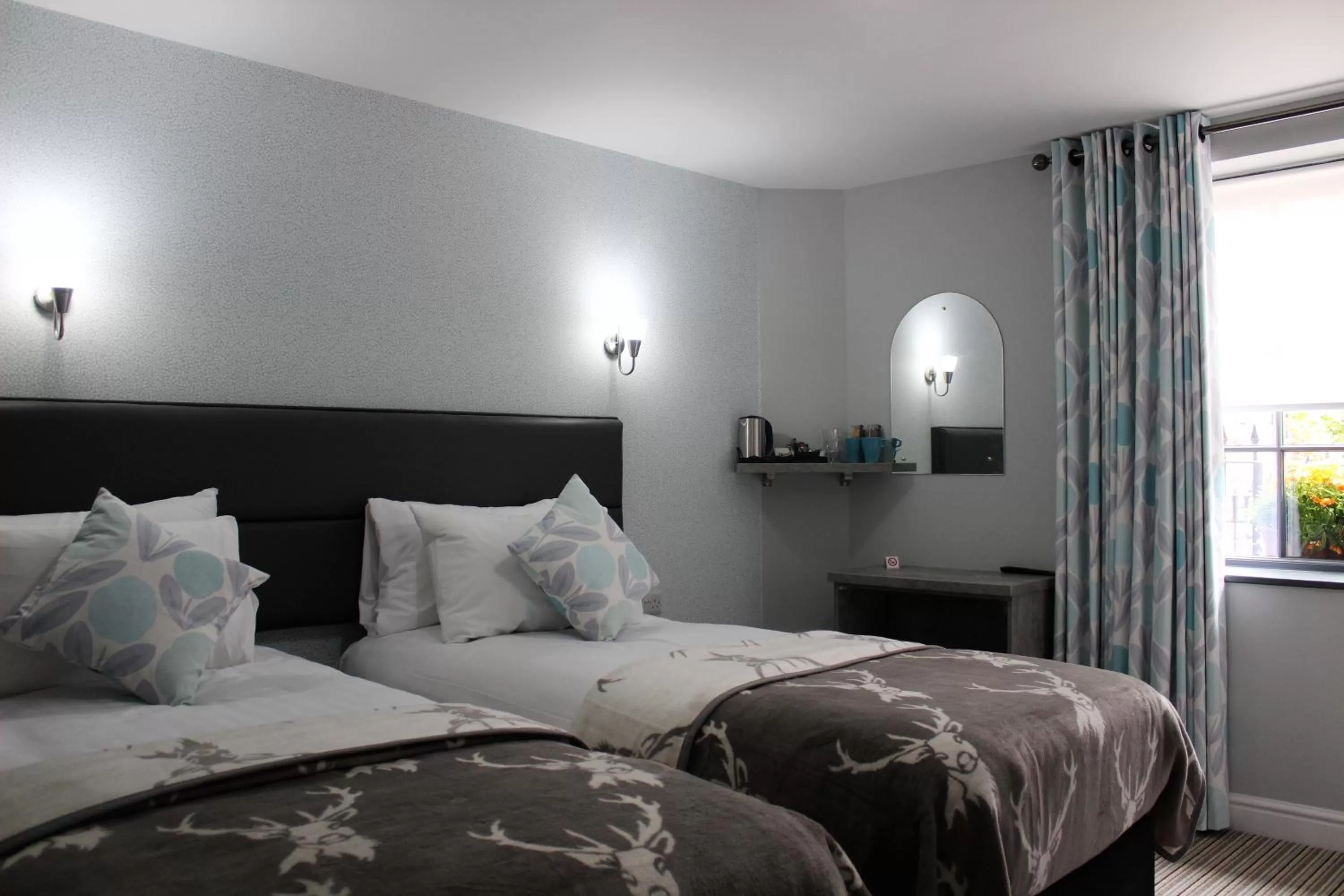 Bed in The Royal Hotel and Bar