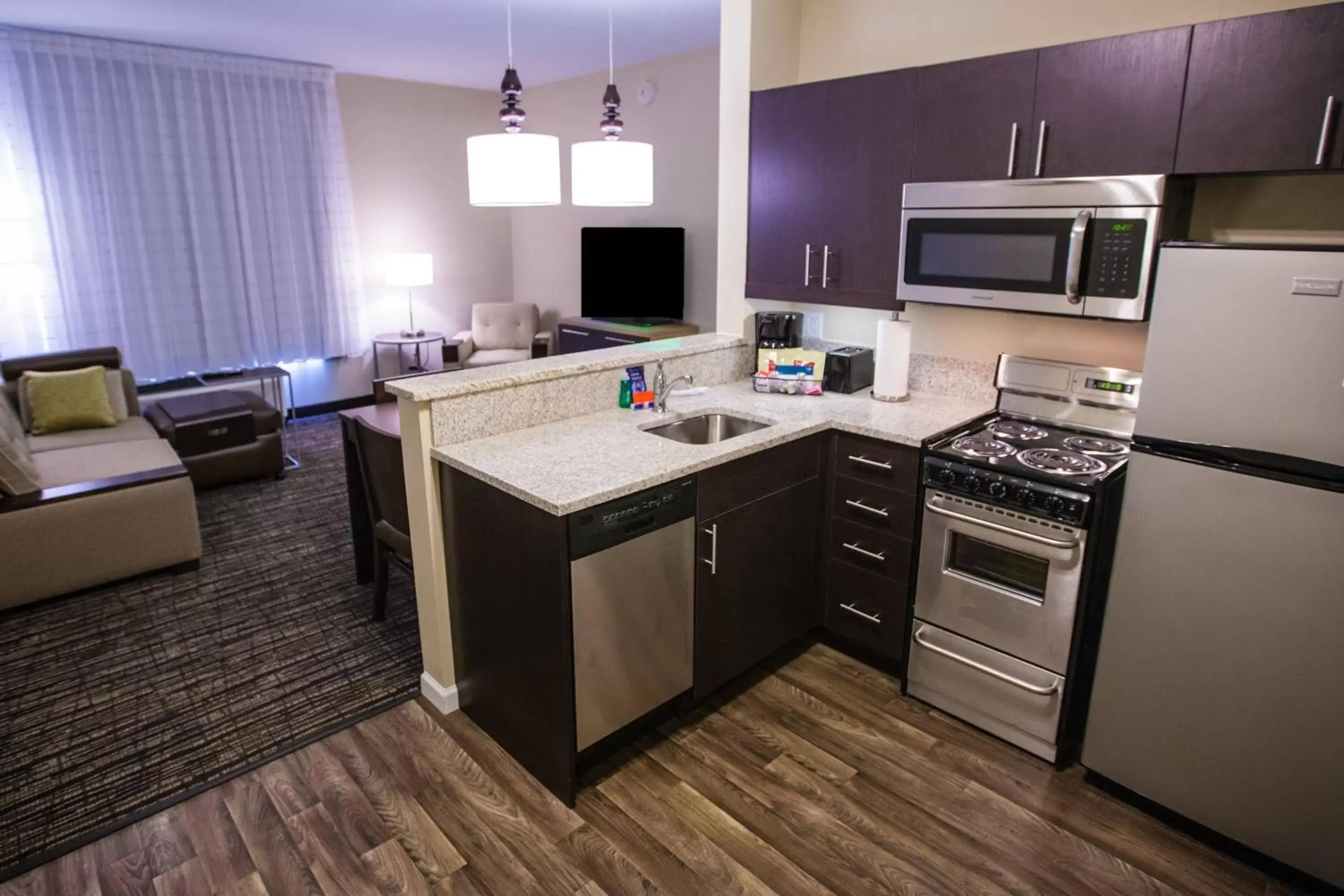Bedroom, Kitchen/Kitchenette in TownePlace Suites by Marriott Boynton Beach