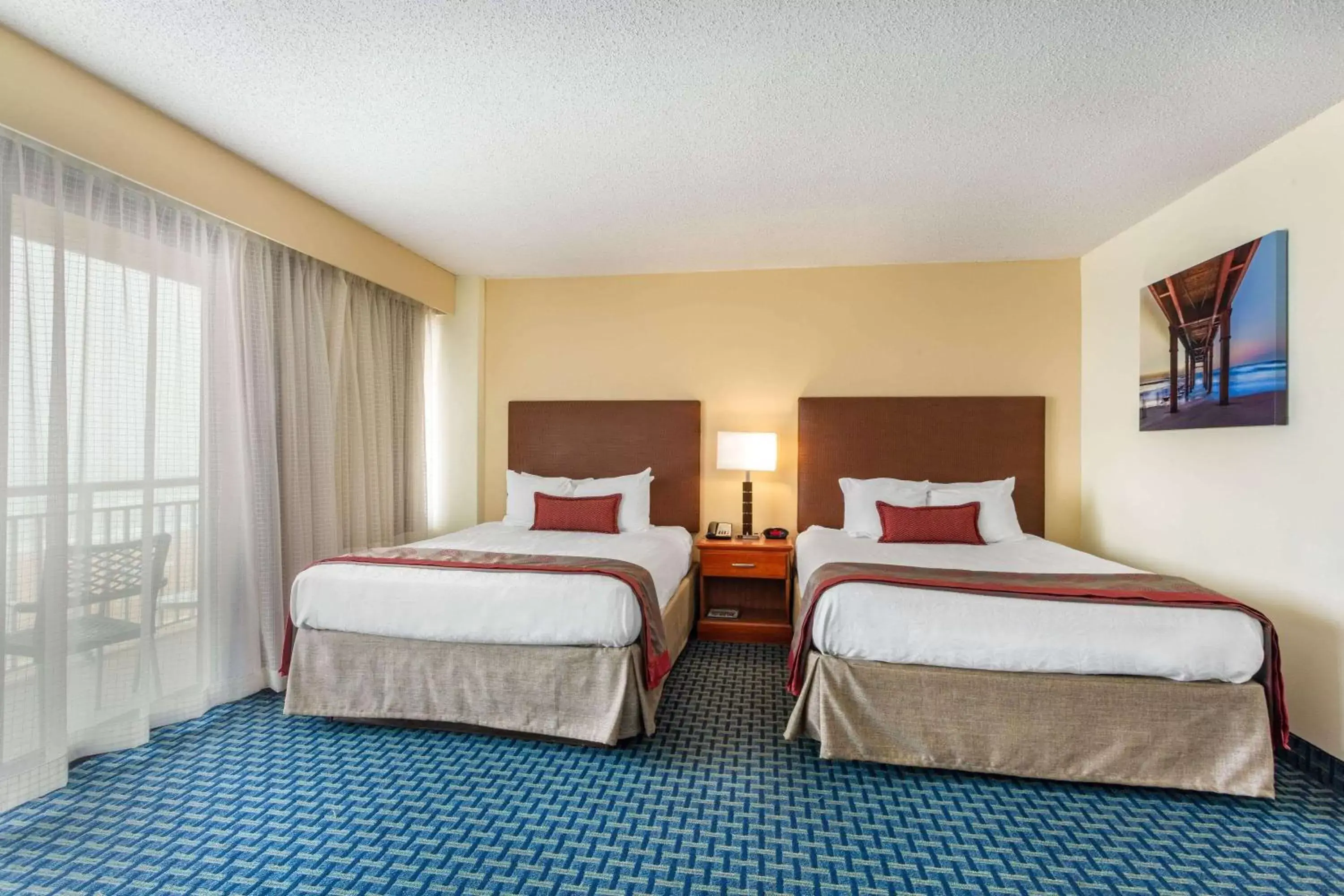 Photo of the whole room, Bed in Ramada Plaza by Wyndham Virginia Beach