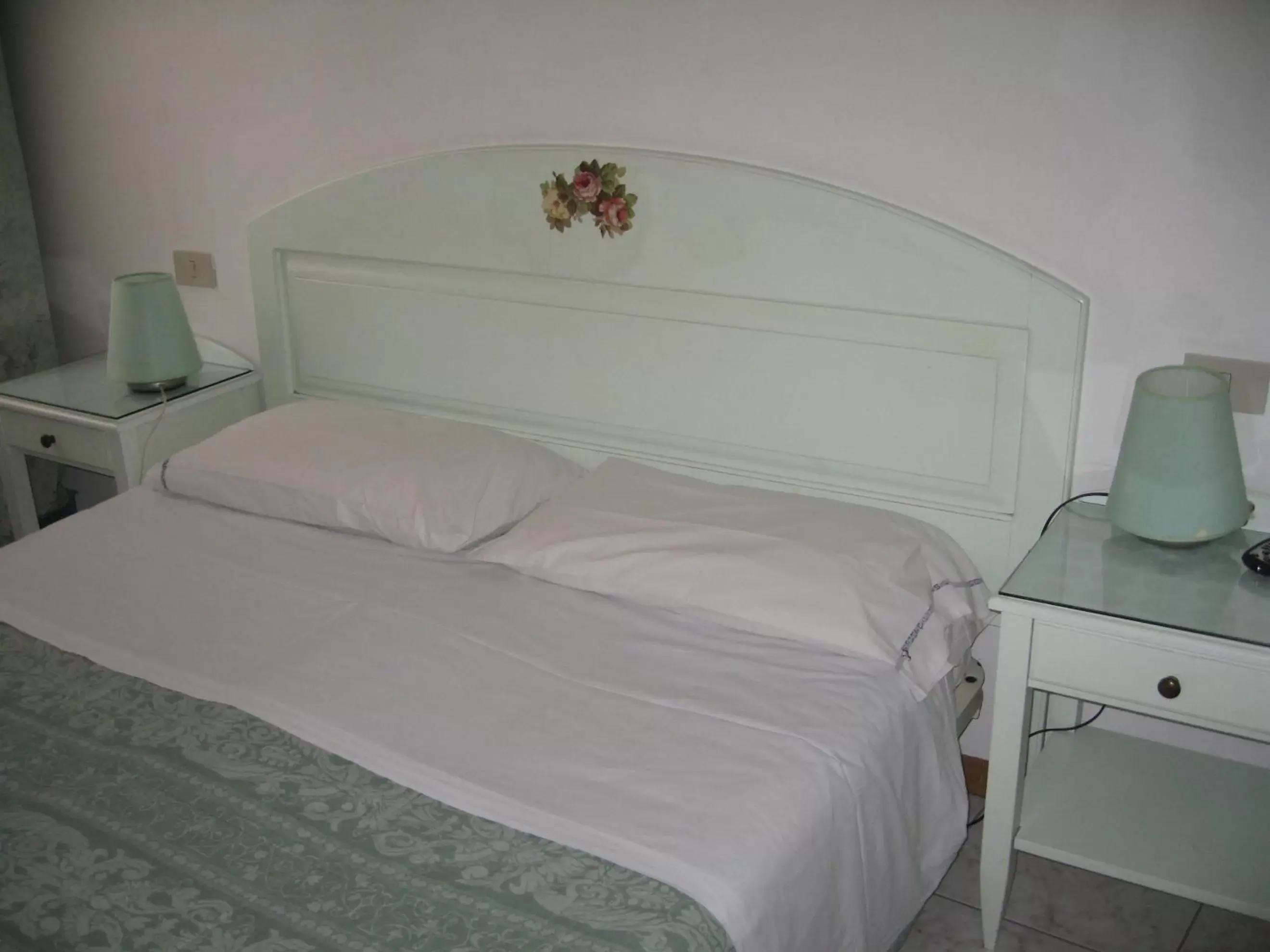 Bed in Hotel Adua