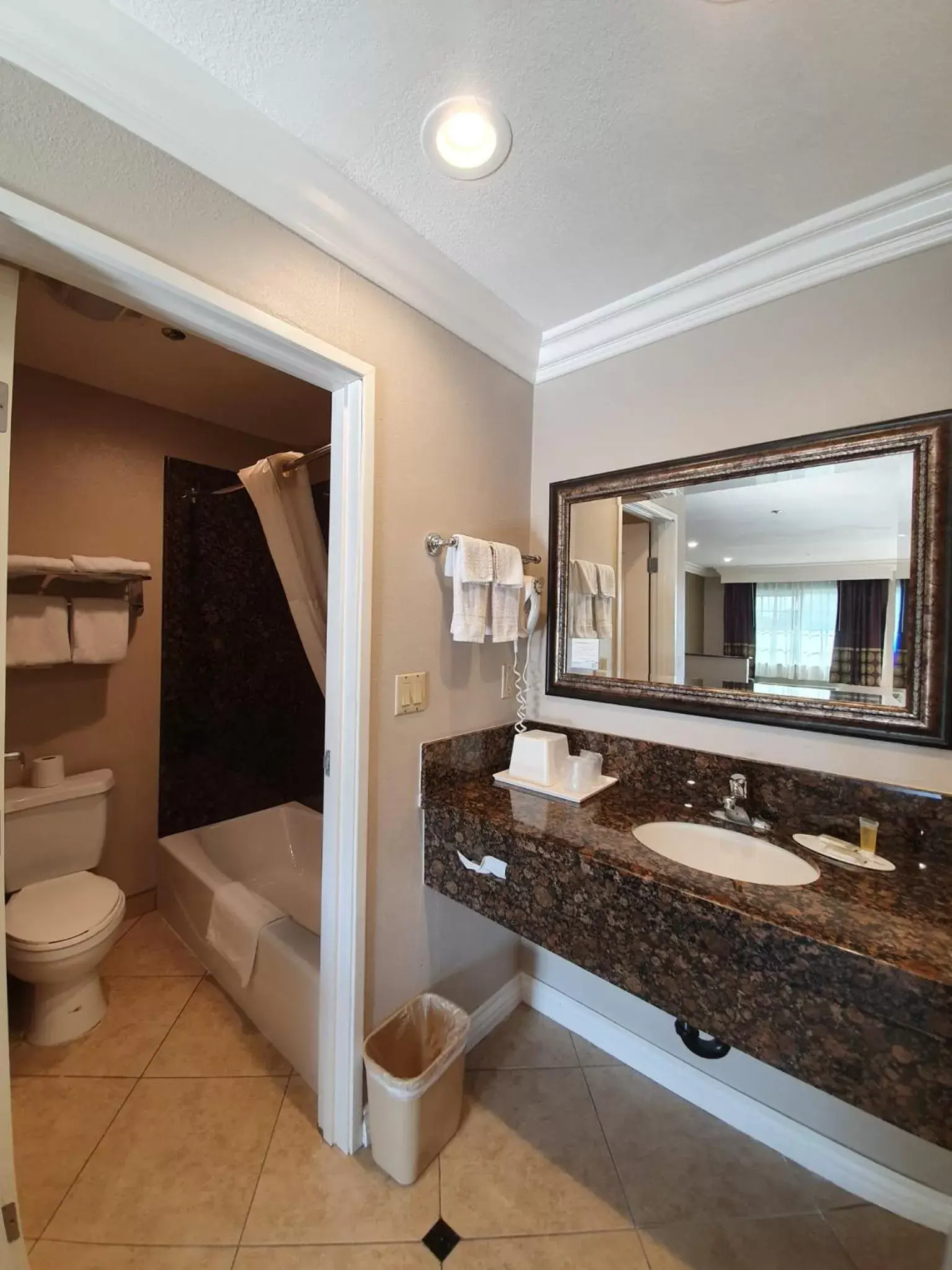 Bathroom in Super 8 by Wyndham Cypress Buena Park Area