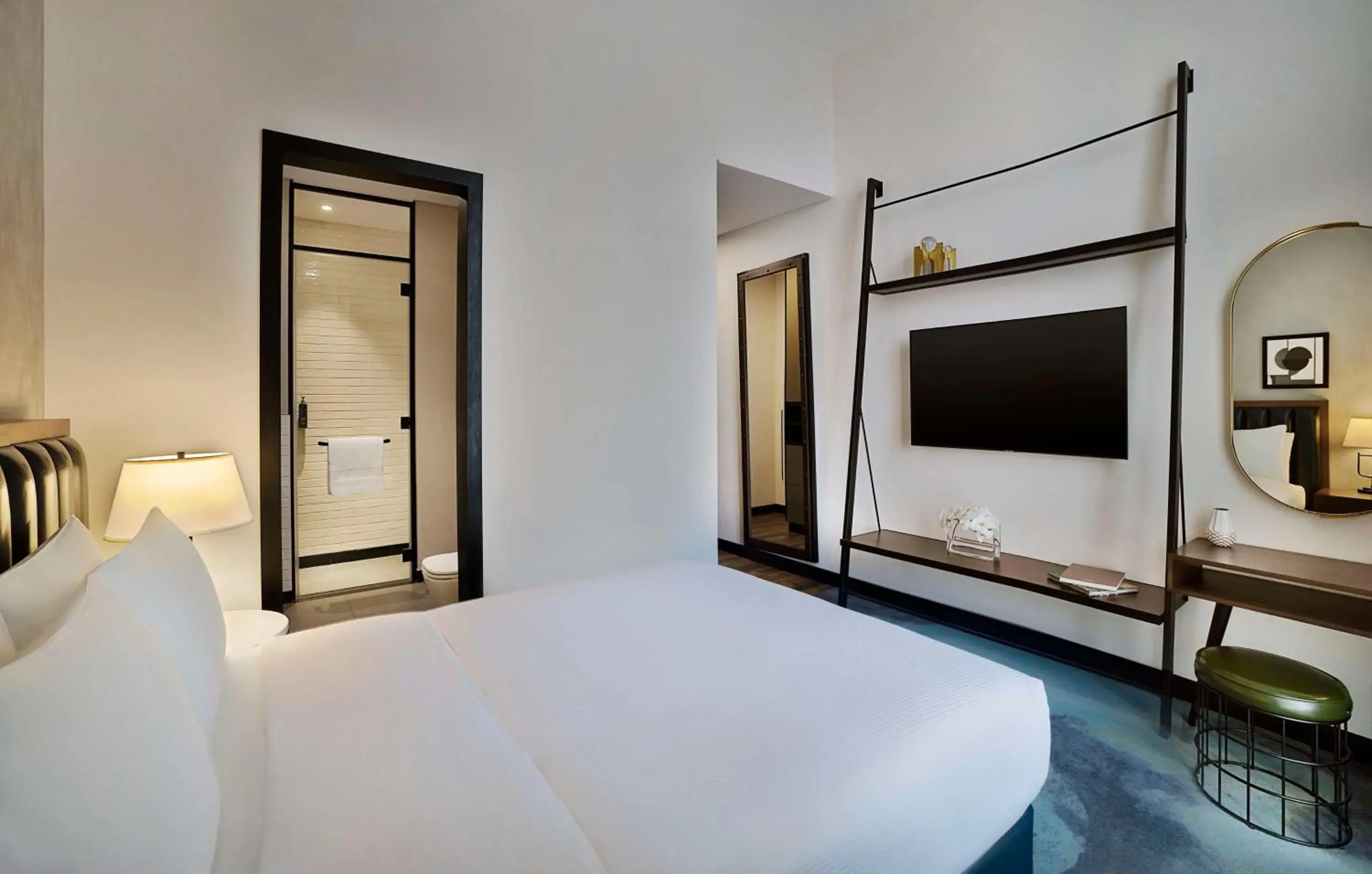 Bed in DoubleTree by Hilton Dubai M Square Hotel & Residences