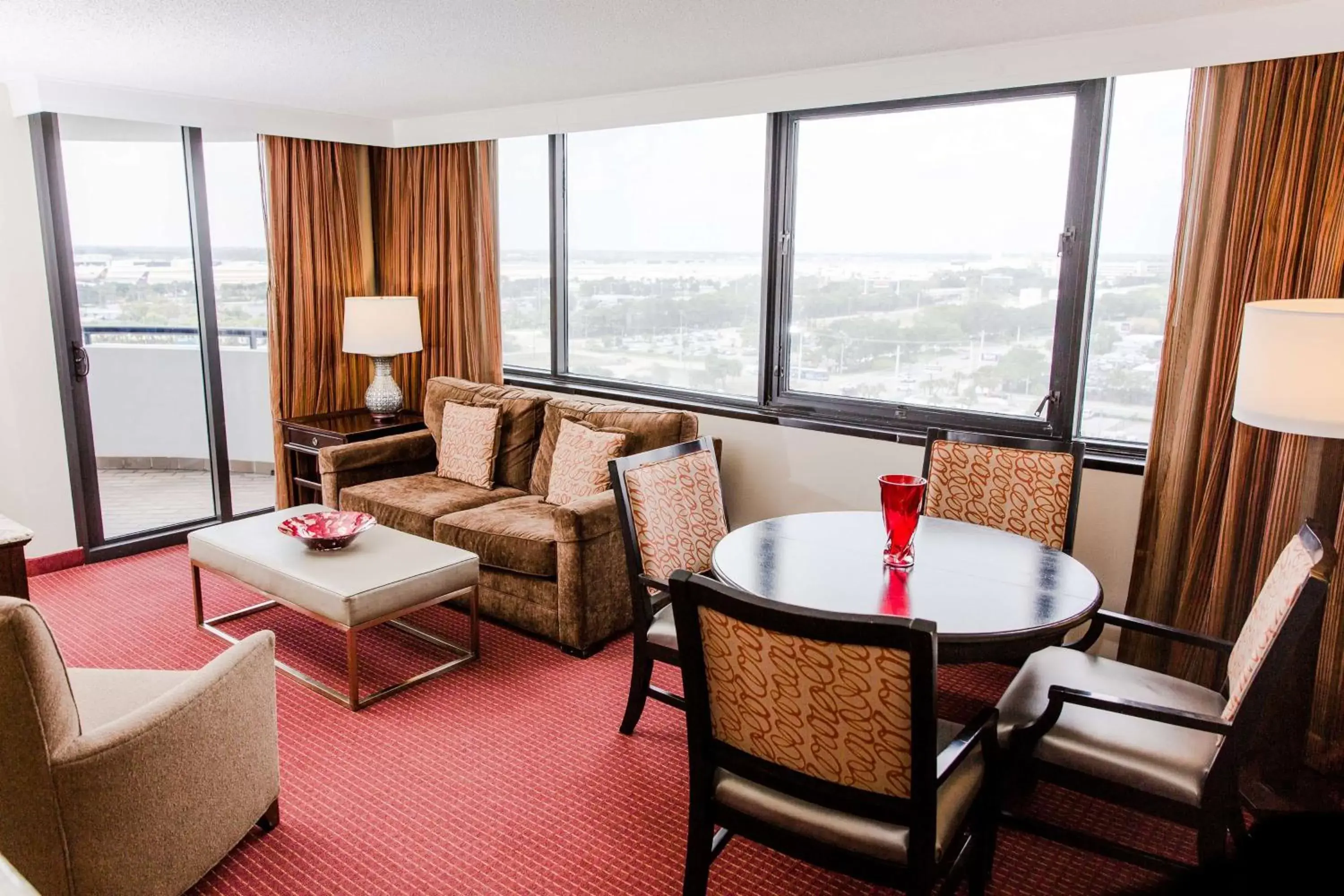 Living room, Seating Area in Embassy Suites by Hilton West Palm Beach Central