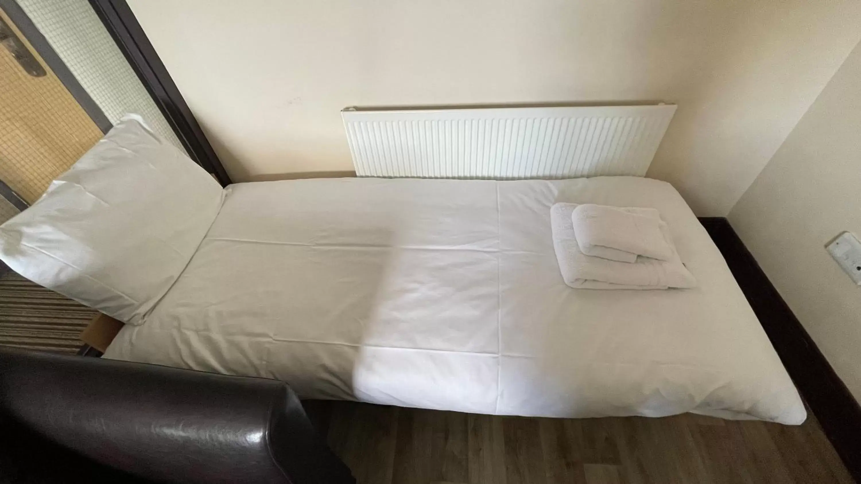 Bed in William's Hillsborough Apartments