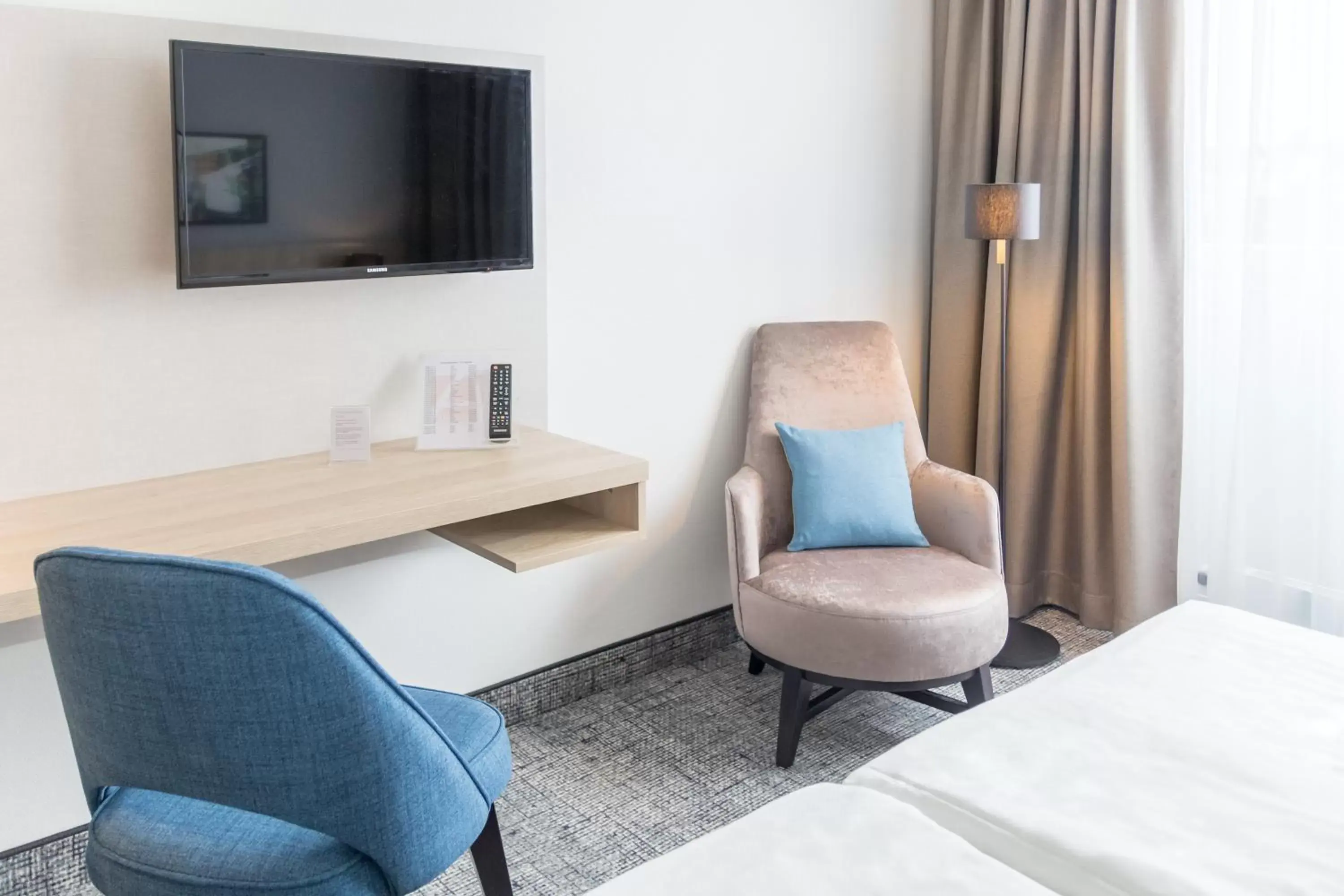 TV and multimedia in Ramada by Wyndham Flensburg