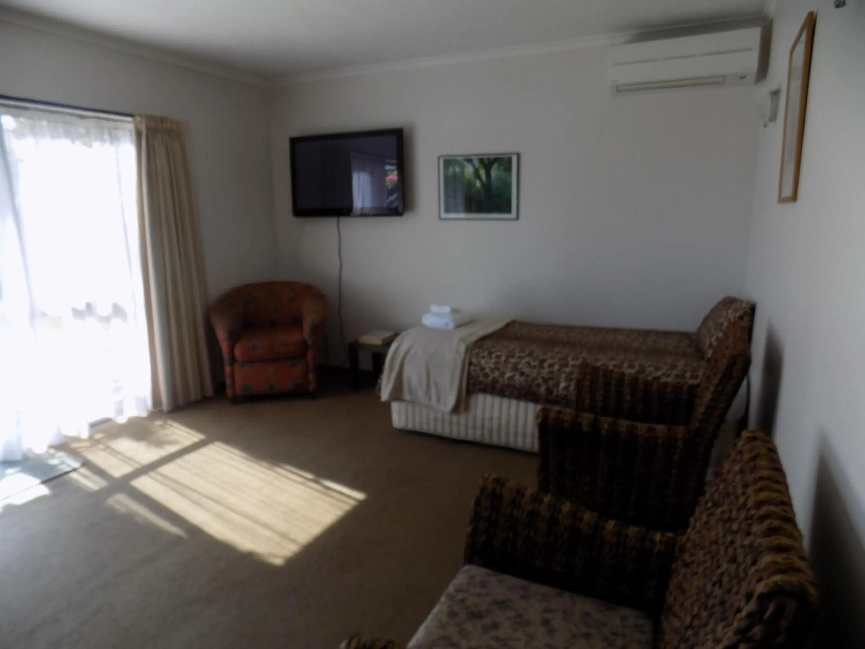 Living room, Seating Area in Garden City Motel