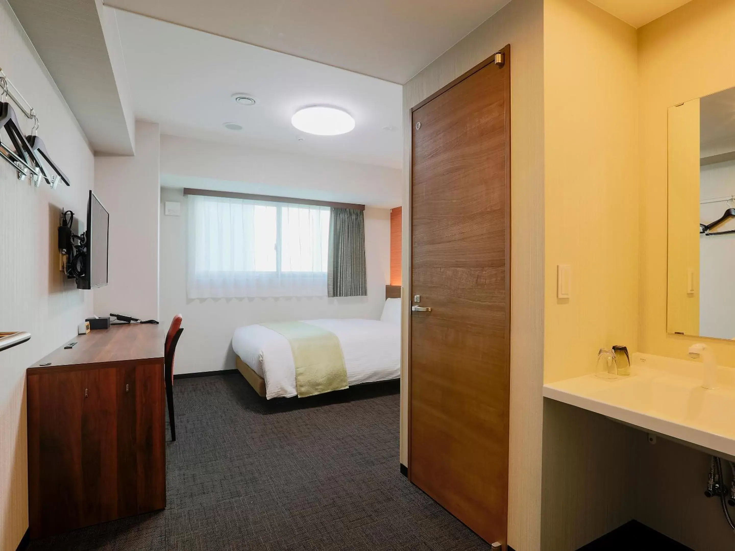 Photo of the whole room, Bed in Hotel Wing International Takamatsu