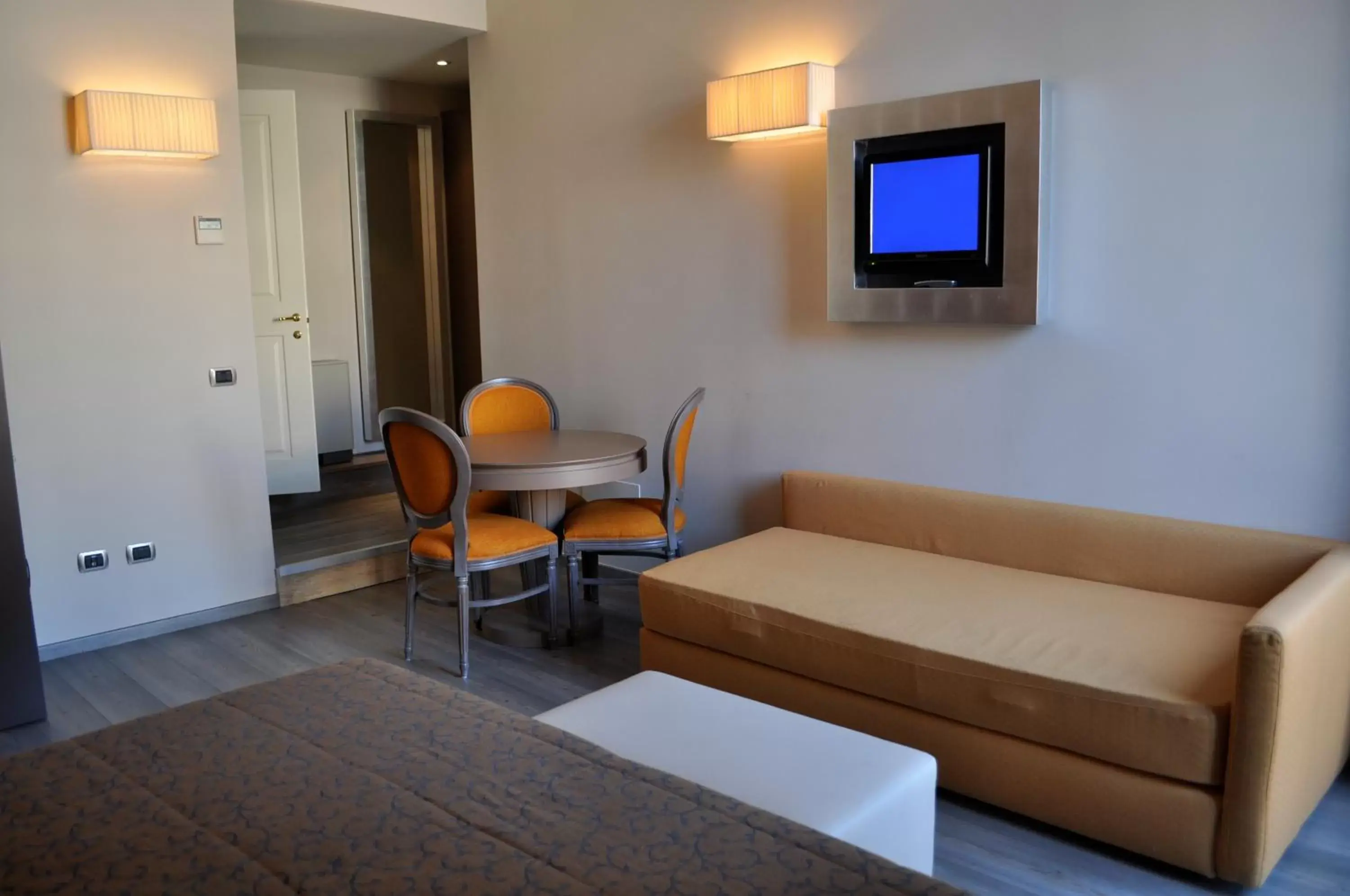 Bedroom, Seating Area in Residence La Repubblica