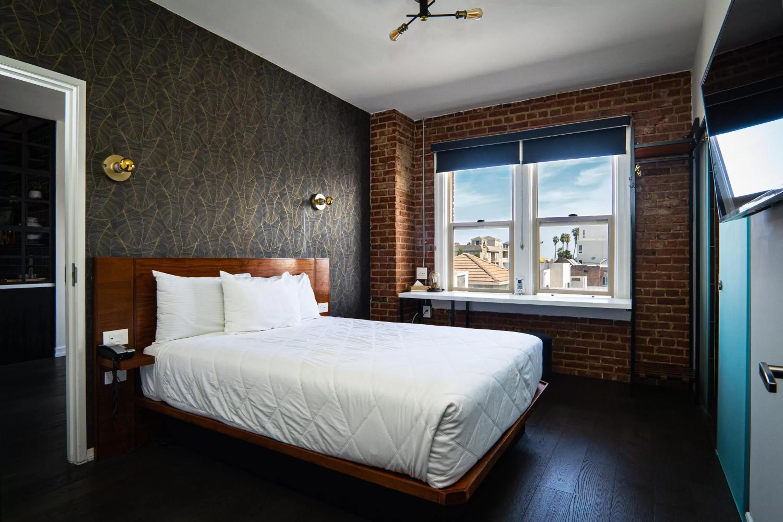 Bed in H by H Hospitality