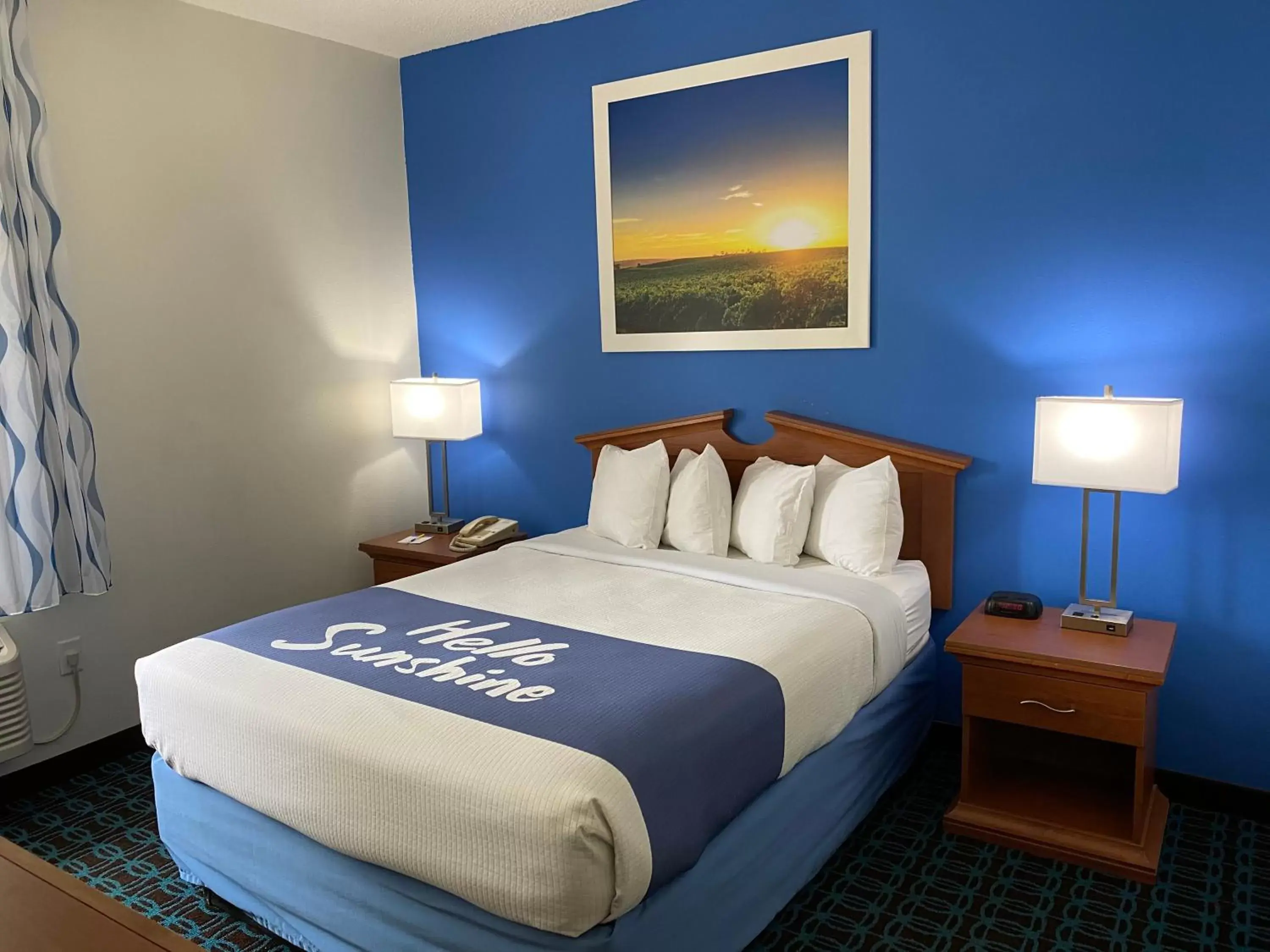 Bed in Days Inn & Suites by Wyndham Cambridge