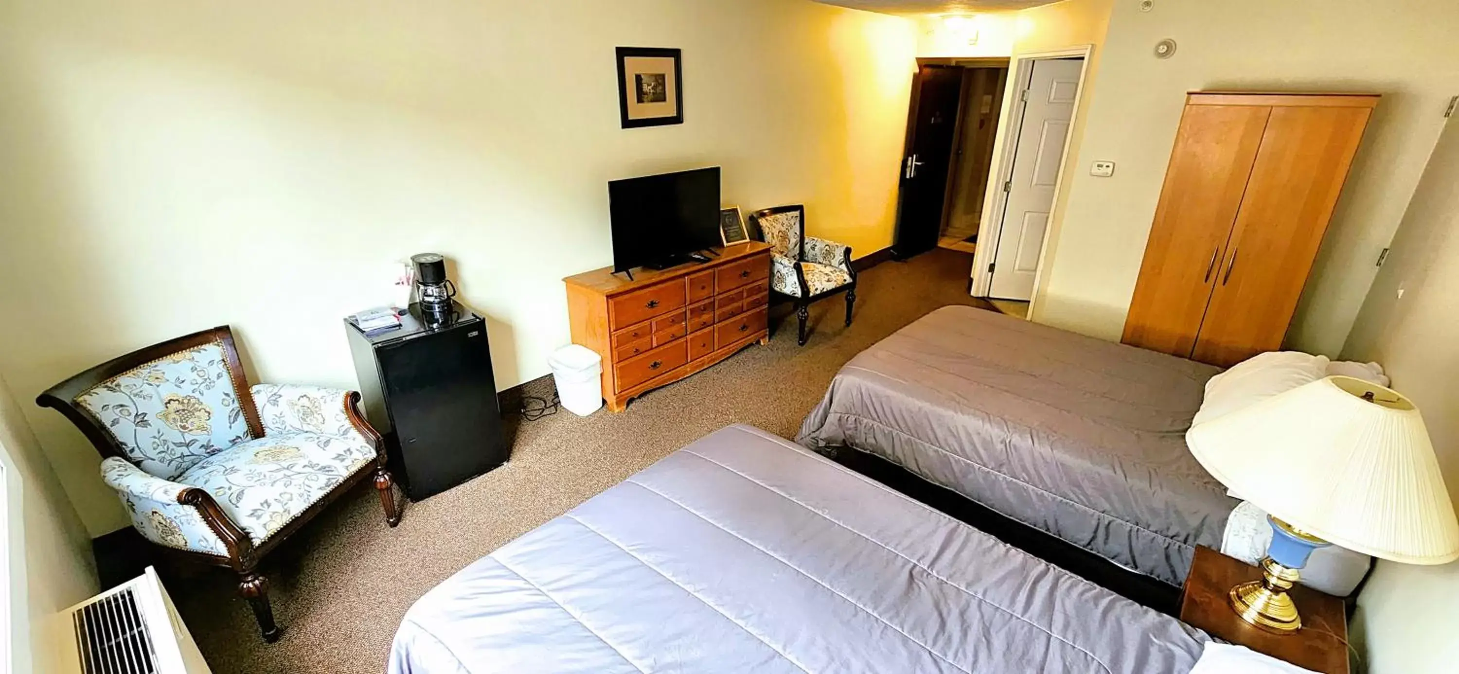 Photo of the whole room, TV/Entertainment Center in The Medicine Hat Villa