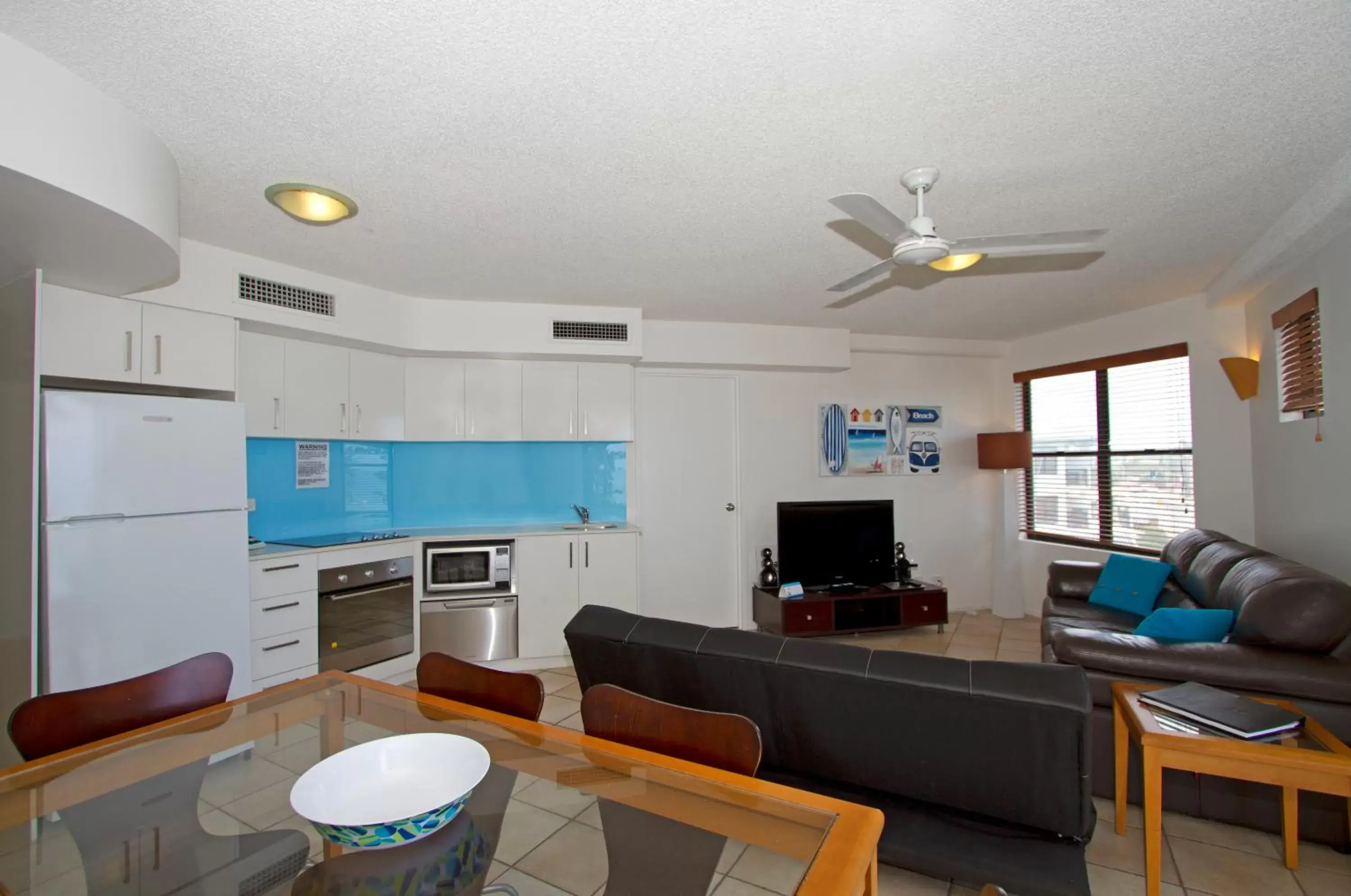 Living room, Kitchen/Kitchenette in The Beach Retreat Coolum