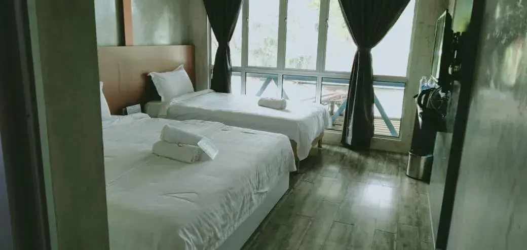 Bed in Rick Resort Teluk Intan