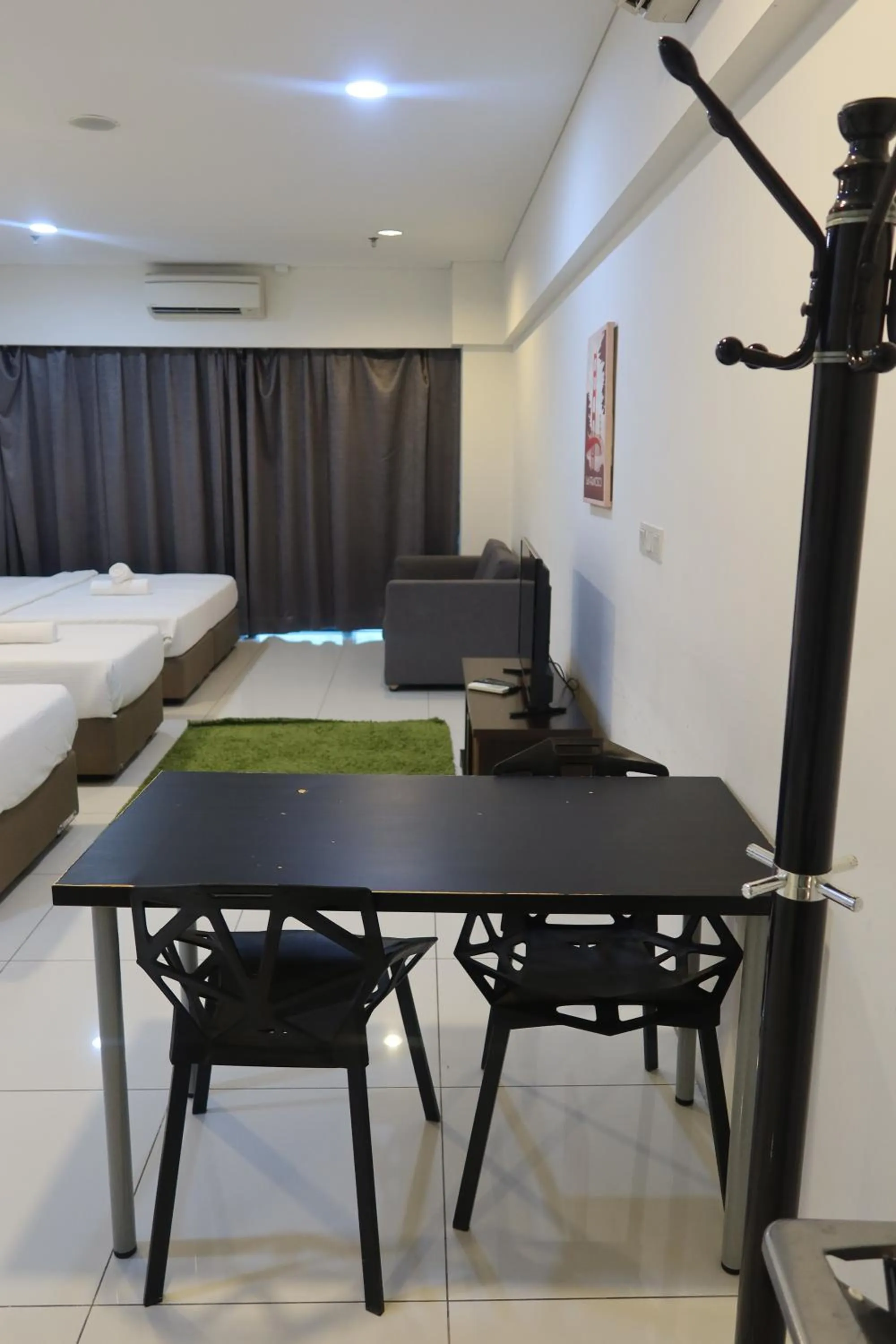 Dining area in Summer Suites Residences by Subhome