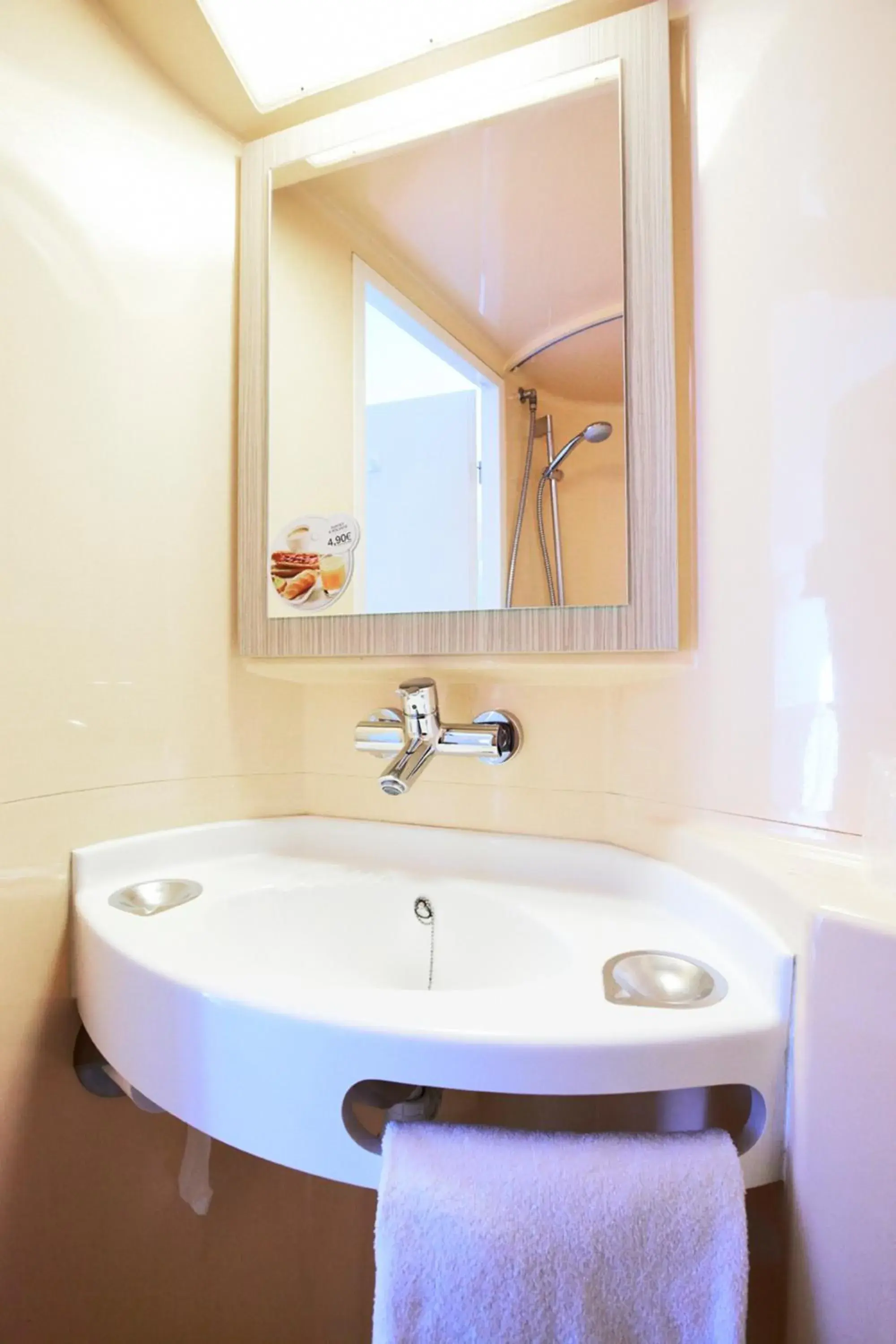 Bathroom in Premiere Classe Paris Ouest - Pont de Suresnes Hotel