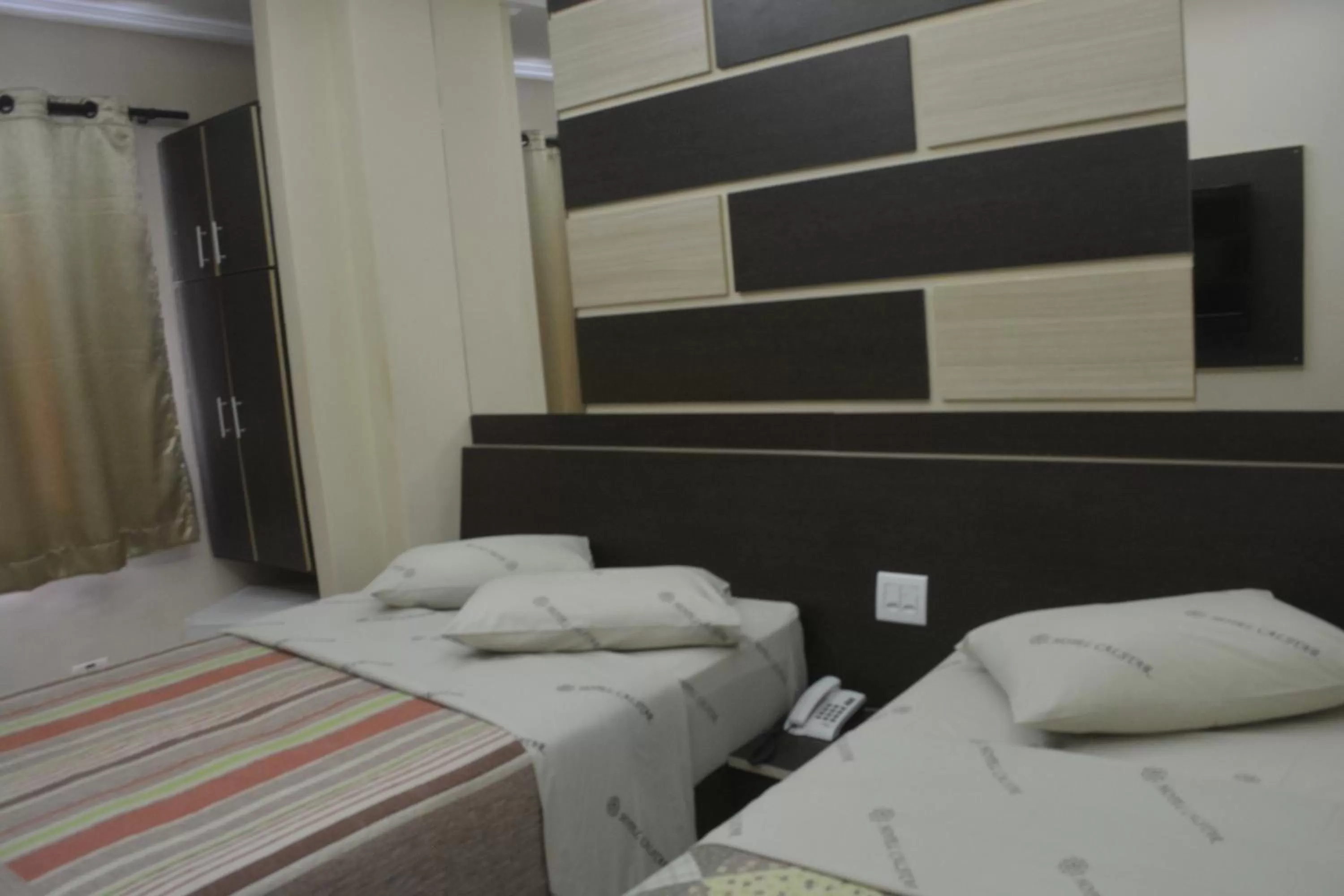 Bed in Hotel Calstar