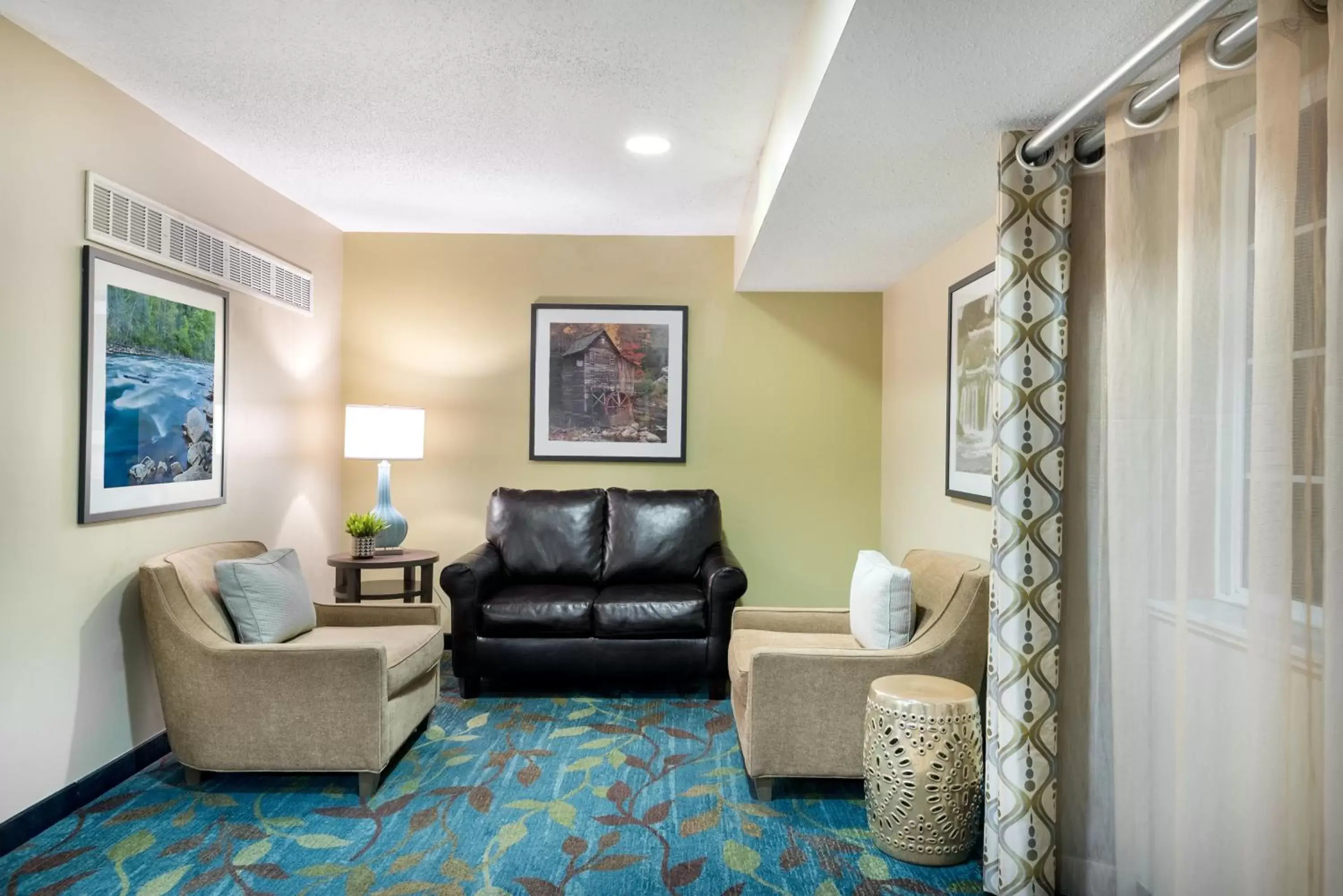 Property building, Seating Area in Candlewood Suites Sterling, an IHG Hotel