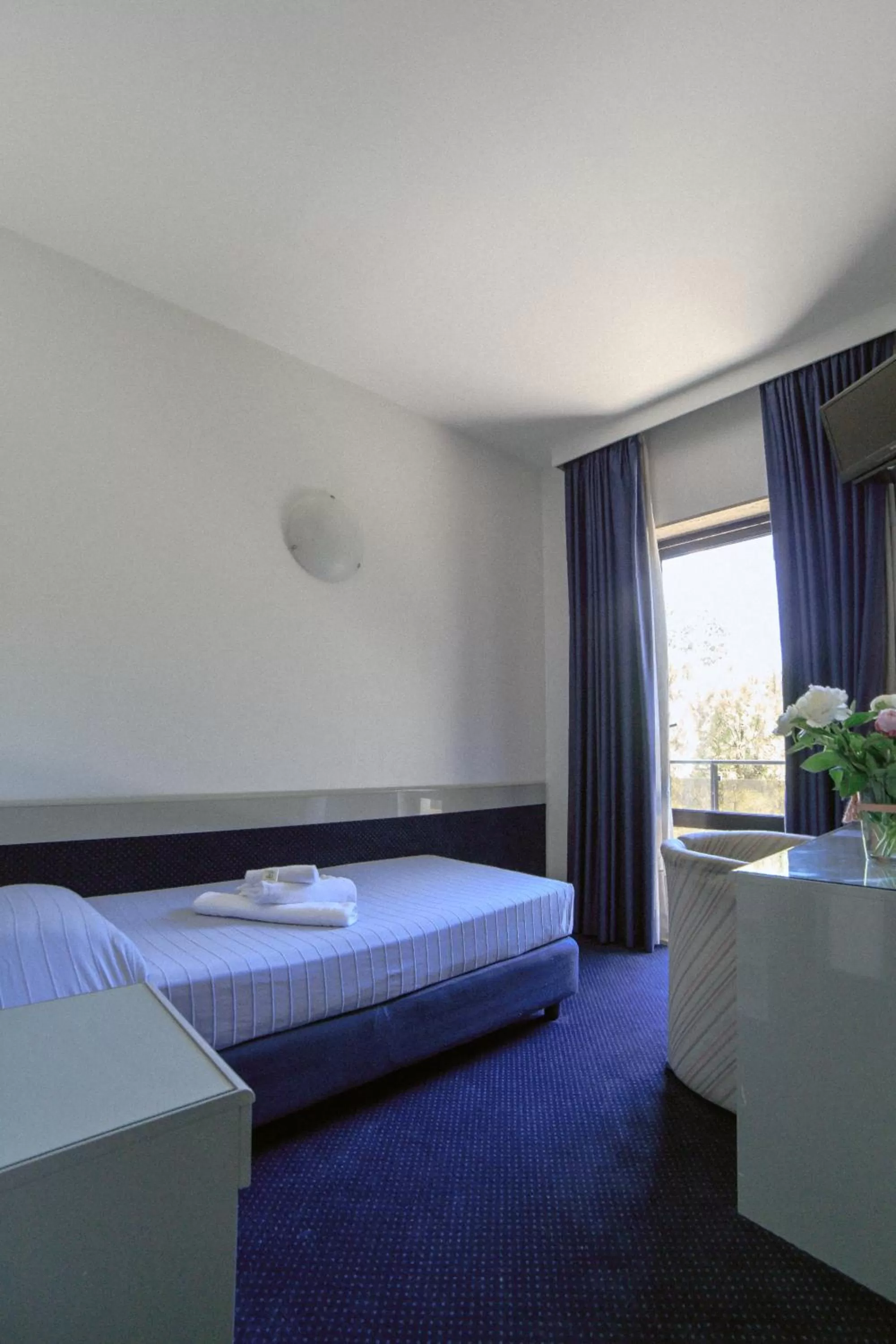 Photo of the whole room, Bed in Club Hotel